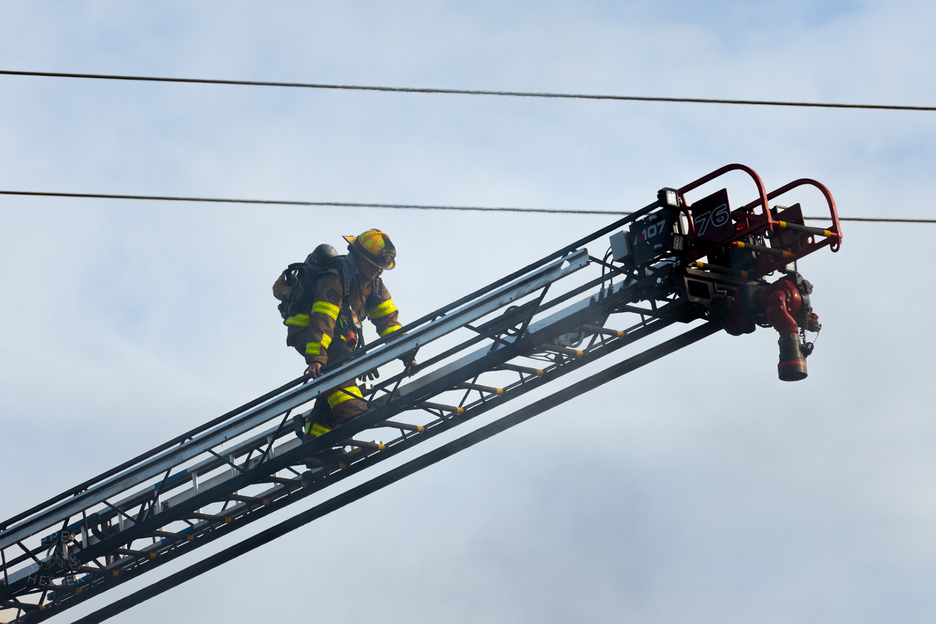 Firefighter Battling Flames From the Aerial at The Old Library on Preston Highway. May 31st, 2024/Aspen Hester