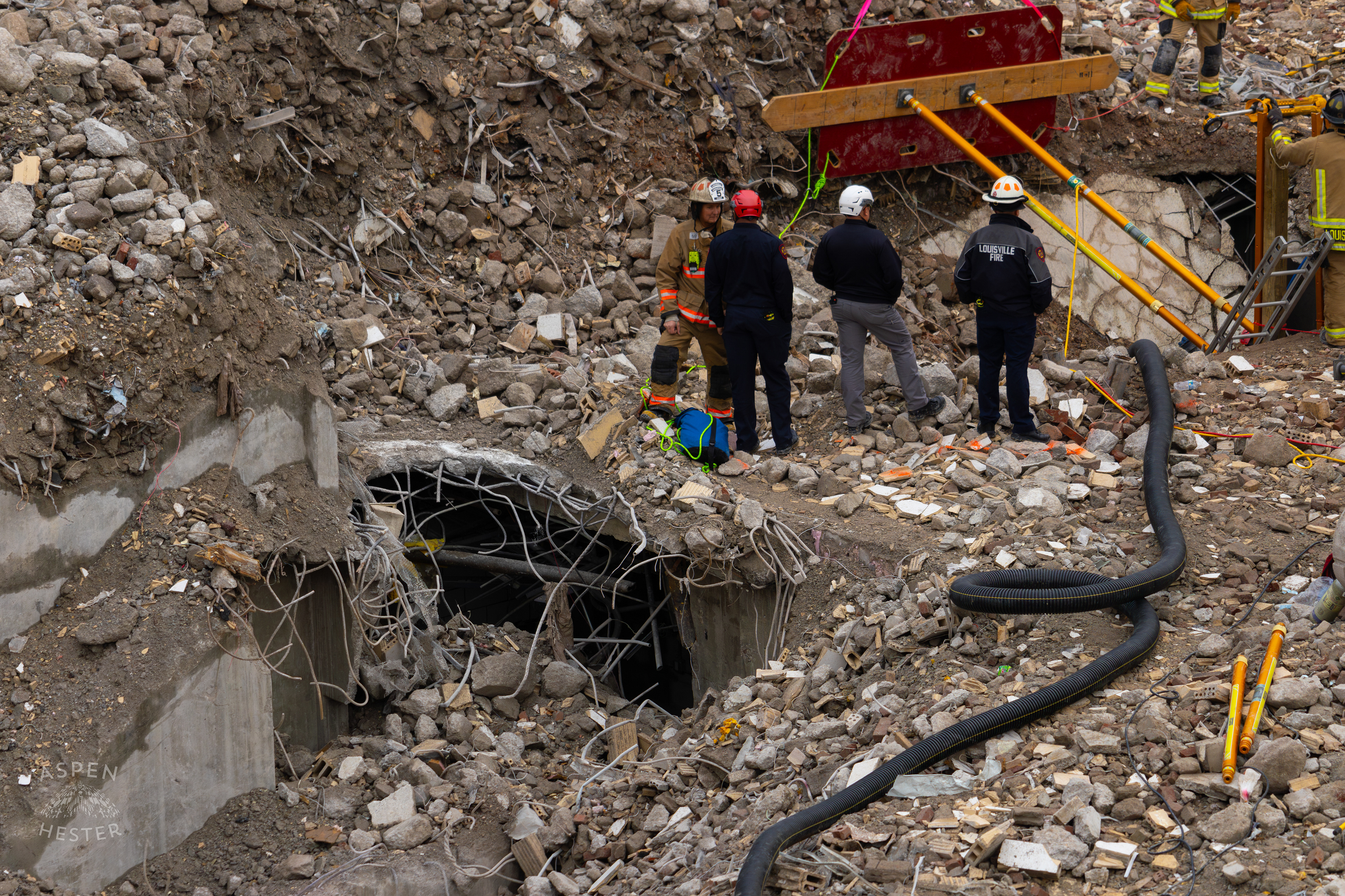 Massive Shoring Holds Back Rubble as Crew Members Anxiously Watch the 8+ Hour LFD Effort to Free A Trapped Demo Worker. November 11th, 2024/Aspen Hester