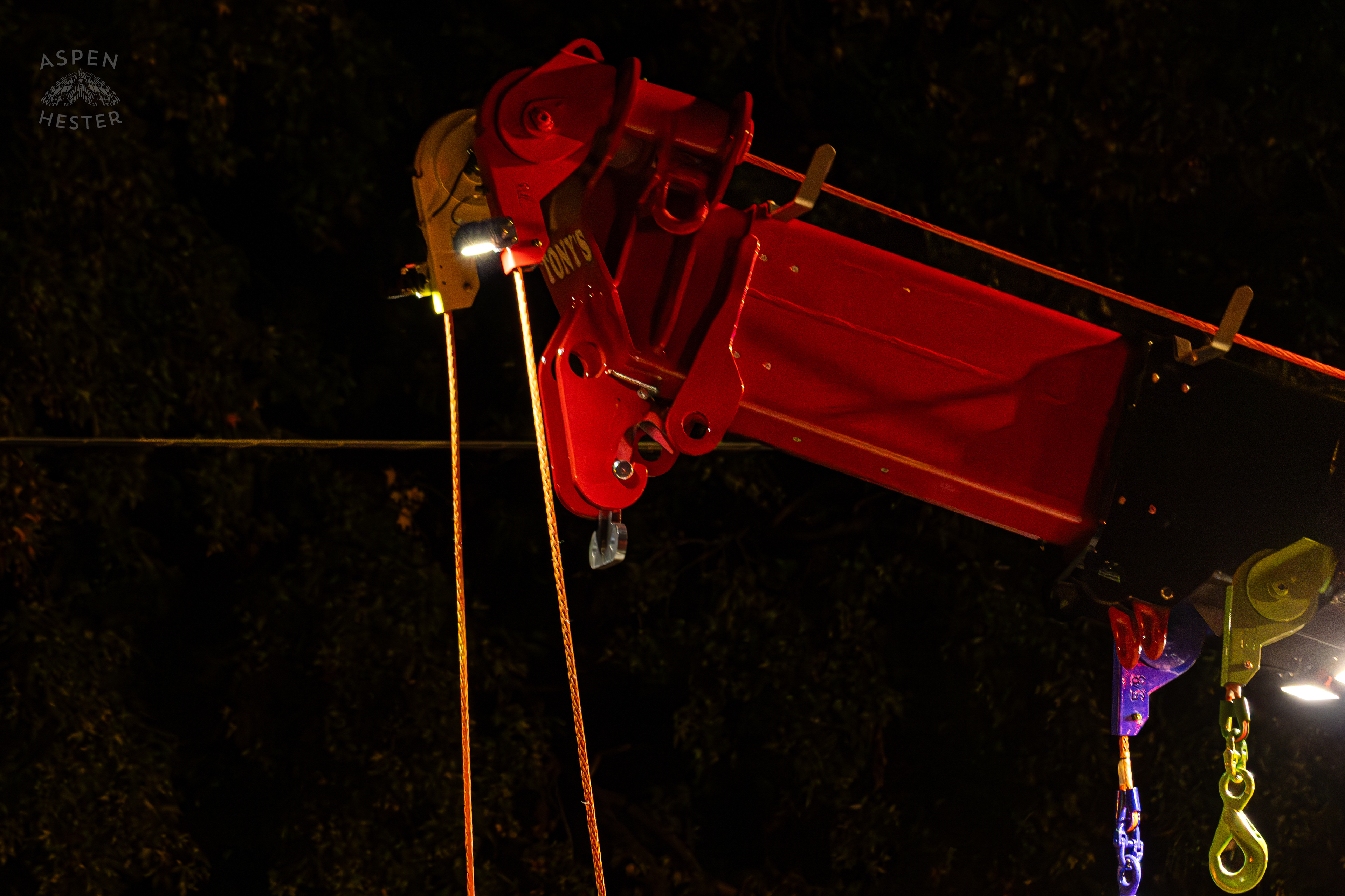 Crane from Tony’s Wreckers Removing The Piper Cherokee Plane from the Road after it Crash Landed, Taking Out Utility Poles, and Hitting A Car on Breckenridge Lane and Kresge Way. October 11th, 2024/Aspen Hester 