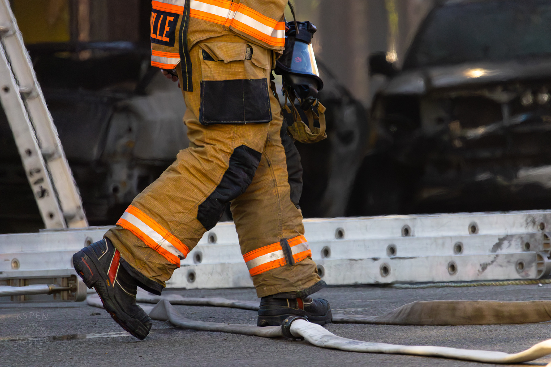 Louisville Firefighter Battling Flames on The Corner of 2nd and Oak Street. June 7th, 2024/Aspen Hester