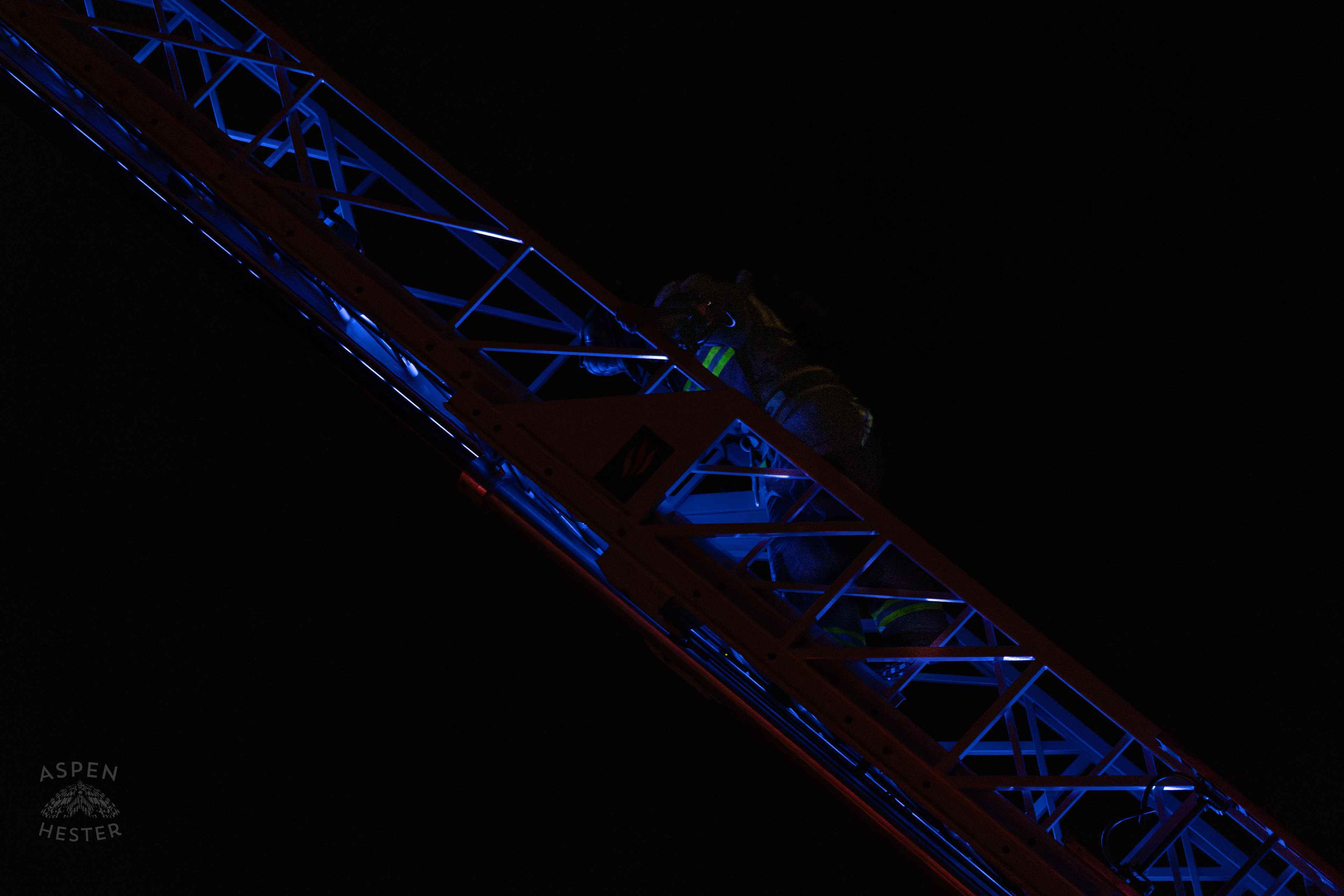 Firefighter Climbing an Aerial to Battle the Massive 3 Alarm Blaze Engulfing The Vacant St. Paul's German Evangelical Church on East Broadway. October 9th, 2024/Aspen Hester