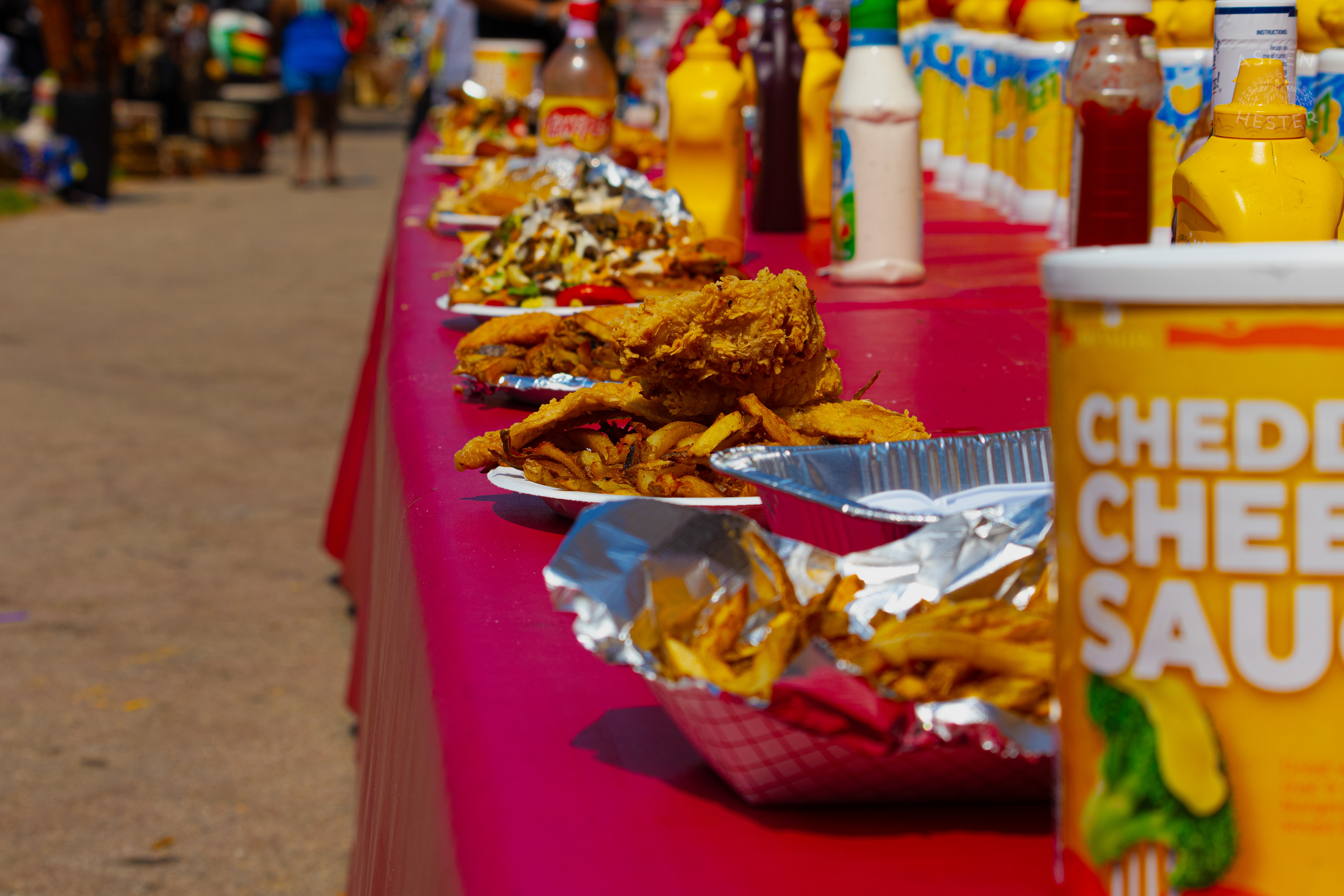 Hot and Ready Food Made by Grandpa's Grill At Opening Day of The 22nd Annual WorldFest. August 30th, 2024. Aspen Hester
