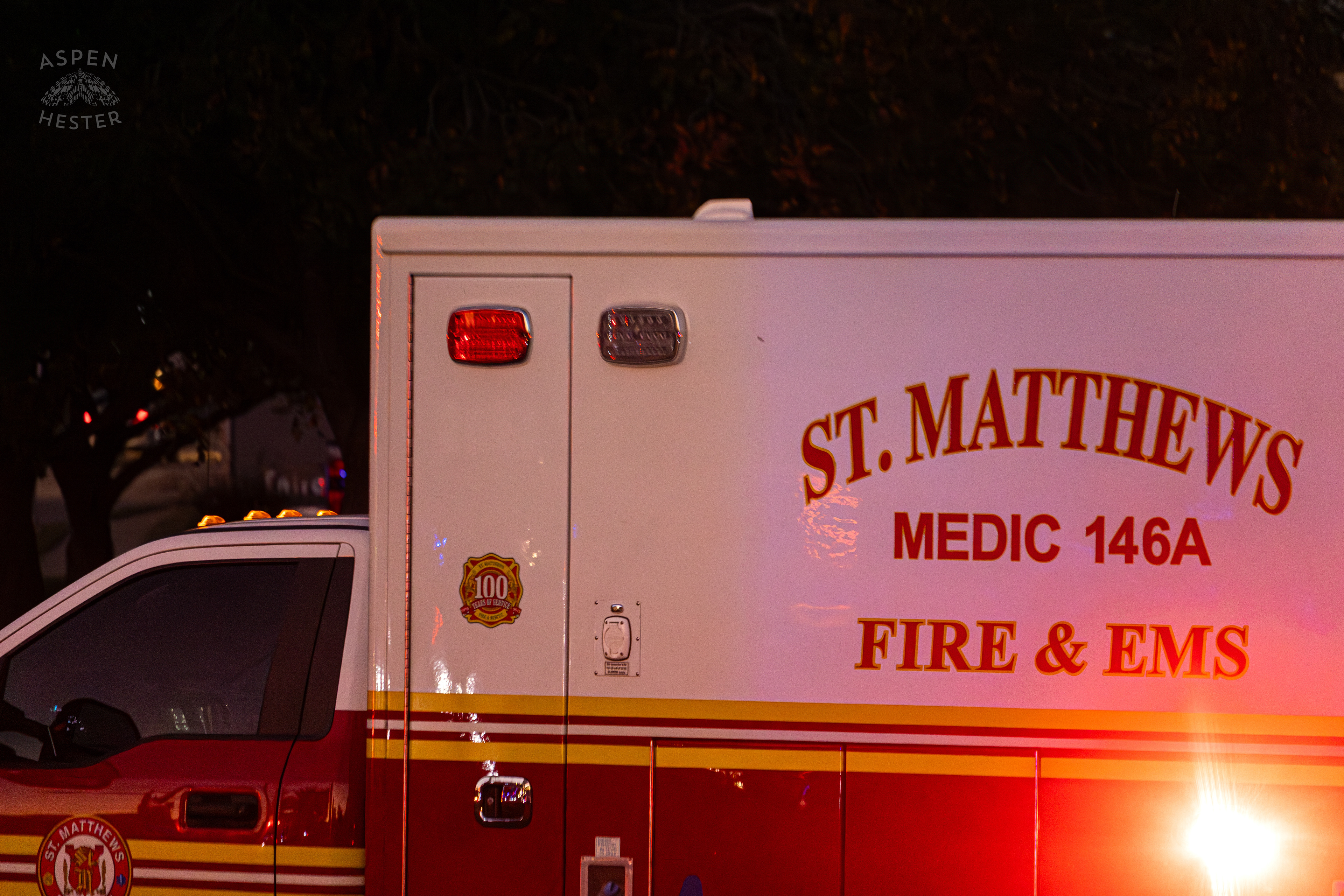 St. Matthews Fire and EMS Ambulance Watches Over The Scene Where A Piper Cherokee Plane Crash Landed, Taking Out Utility Poles, and Hitting A Car on Breckenridge Lane and Kresge Way. October 11th, 2024/Aspen Hester 