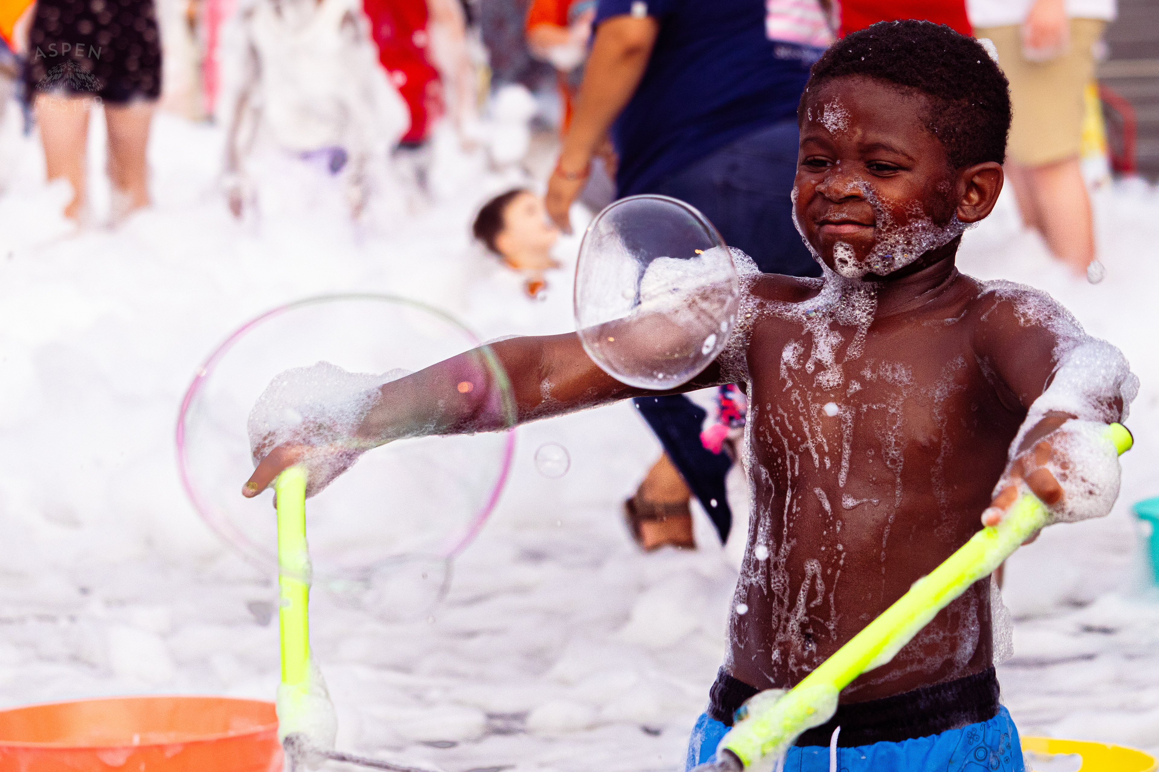Kid Making Bubbles in the Bubble Party at Waterfront Park Fourth of July. July 4th, 2024/Aspen Hester