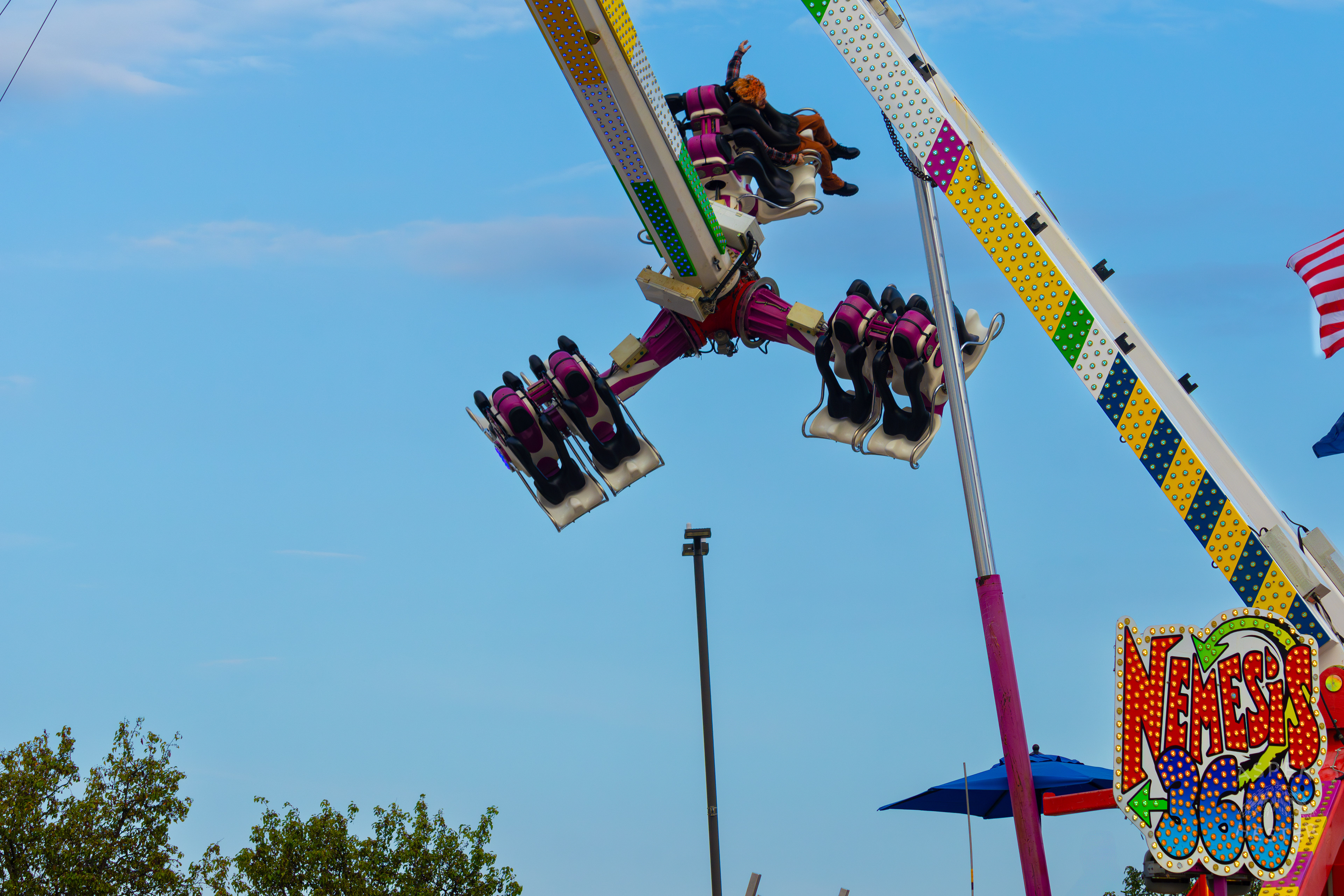 Fair Goers Spinning Around The Sky in the Nemeses 360 at The 120th Kentucky State Fair. July 15th, 2024/Aspen Hester