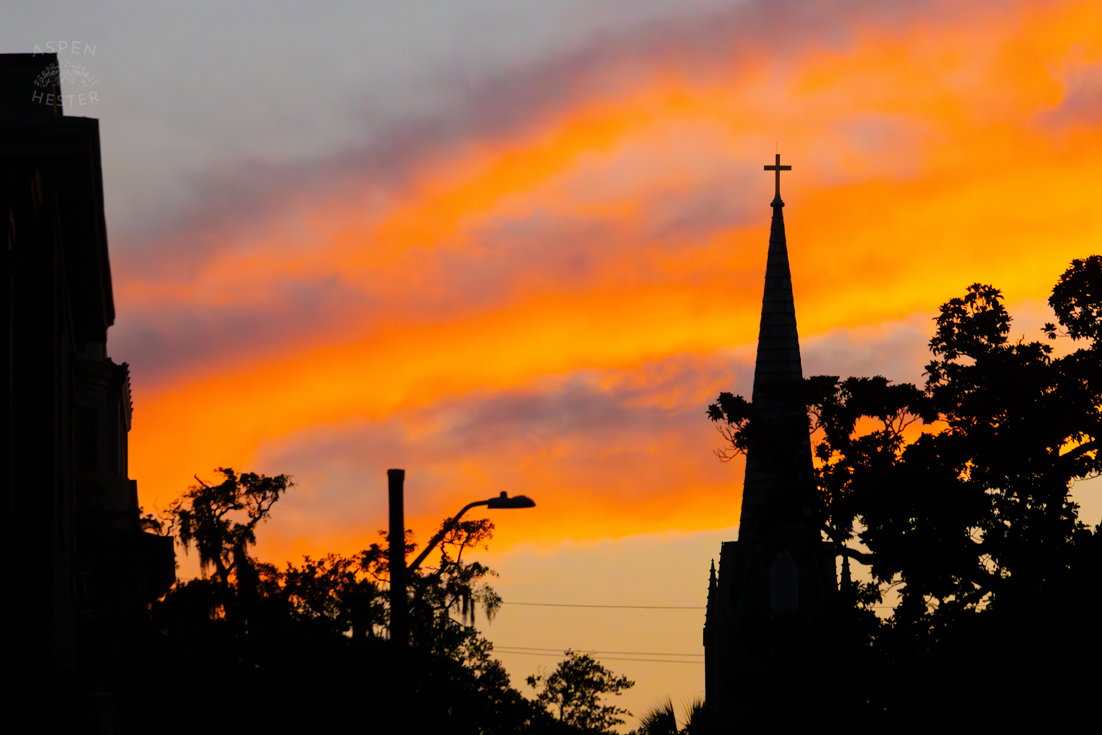 Steeple Against The Fiery Sunset In Savannah Georgia. June 24th, 2024/Aspen Hester