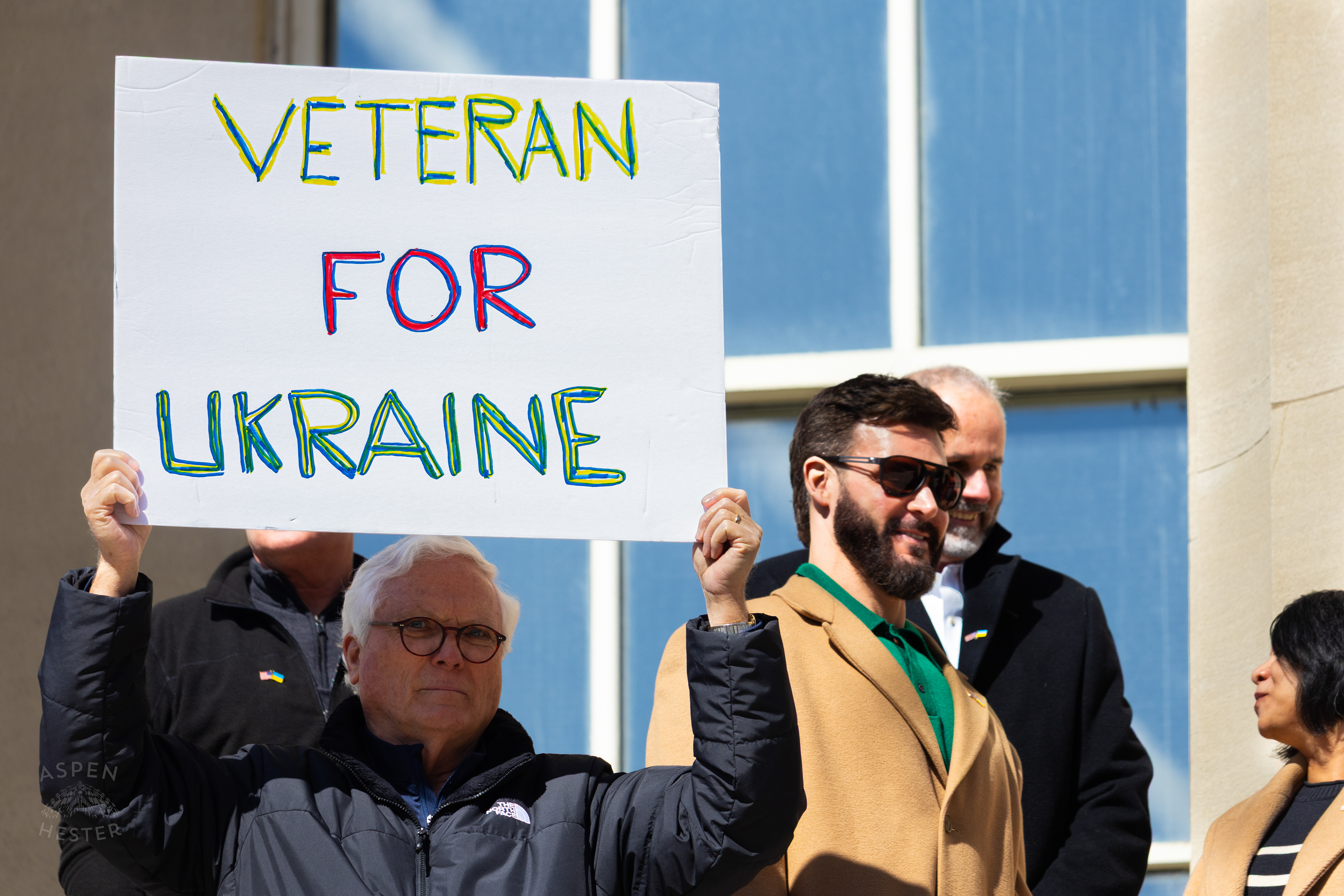 A Louisvillian Holds A Sign Reading “Veteran for Ukraine” as The Community Rallies in Support of Ukraine. March 2nd, 2025/Aspen Hester