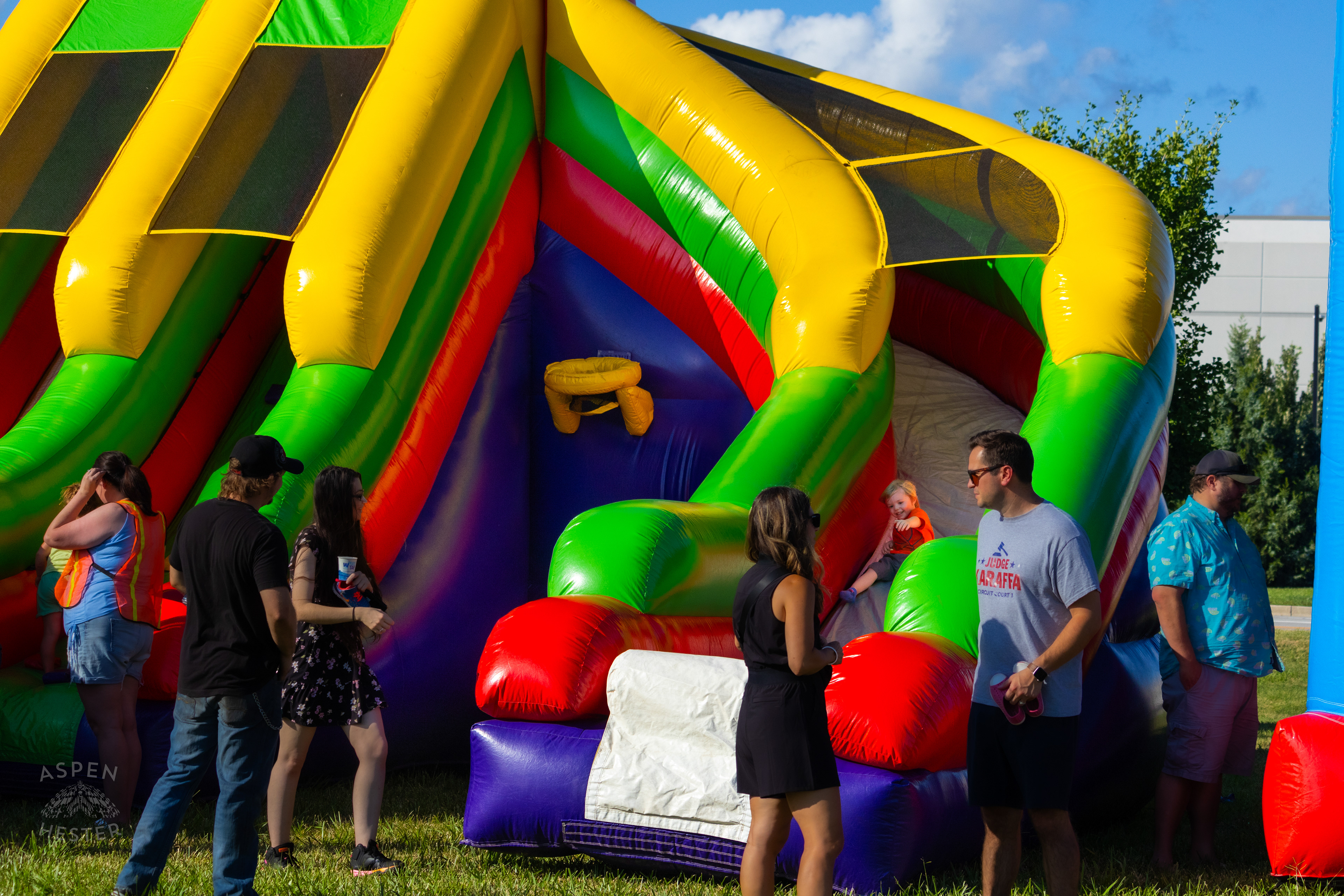 Kid Enjoying the Bouncy Slide at Play America with The Louisville Orchestra. July 5th, 2024/Aspen Hester