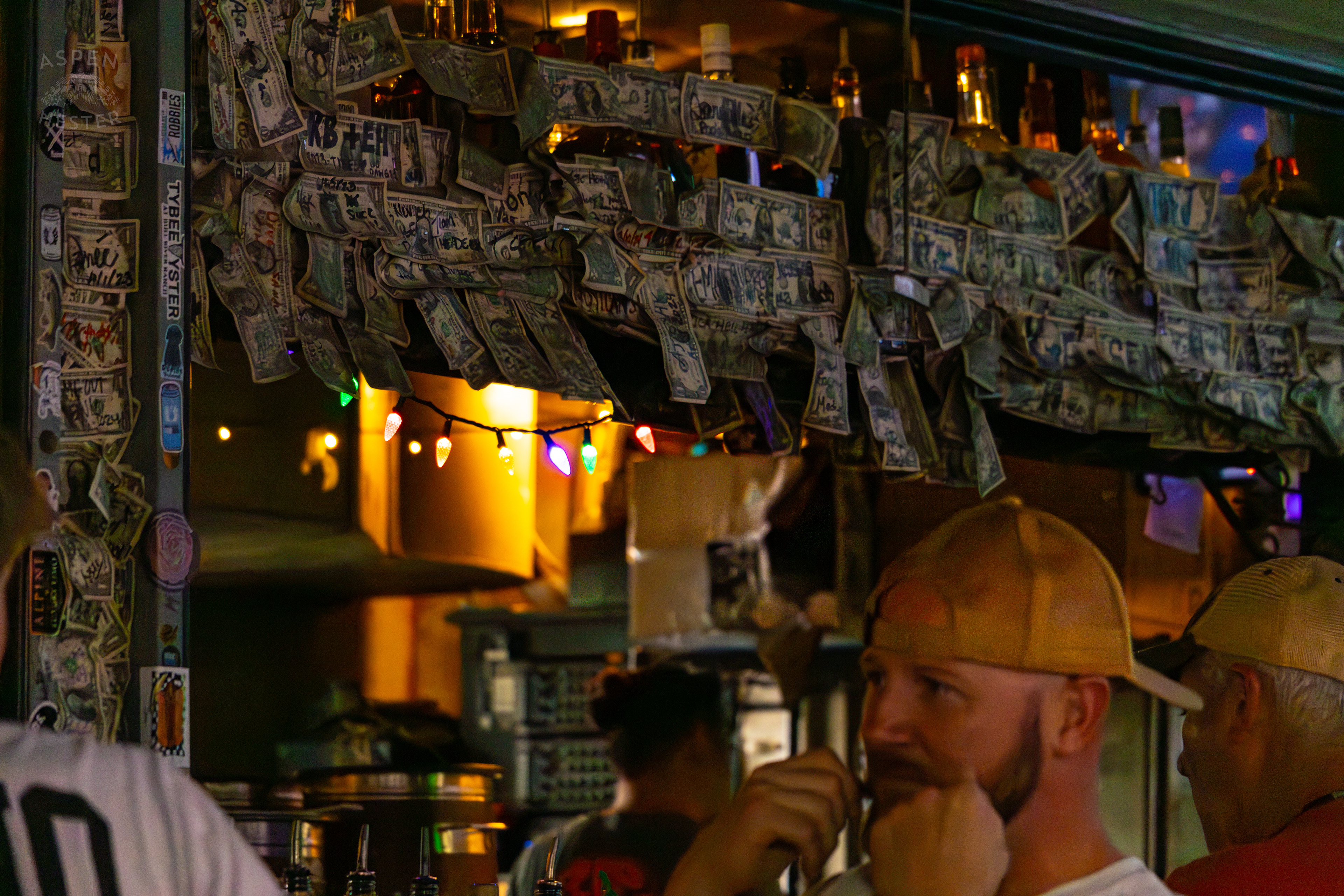 Dollar Bills Stapled to Huc-A-Poos Bites and Booze on Tybee Island Georgia. June 25th, 2024/Aspen Hester