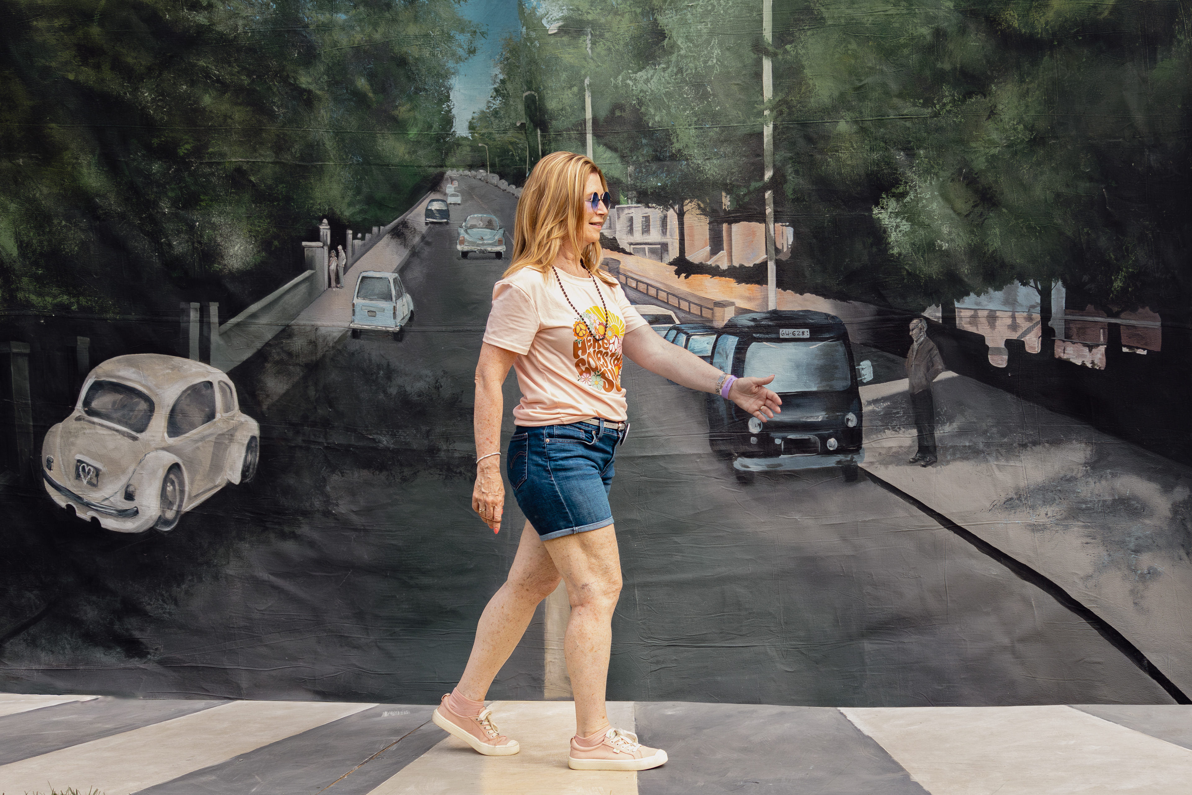 Festival Goer Walks on Abbey Road at Abbey Road on The River. May 25th, 2024/Aspen Hester