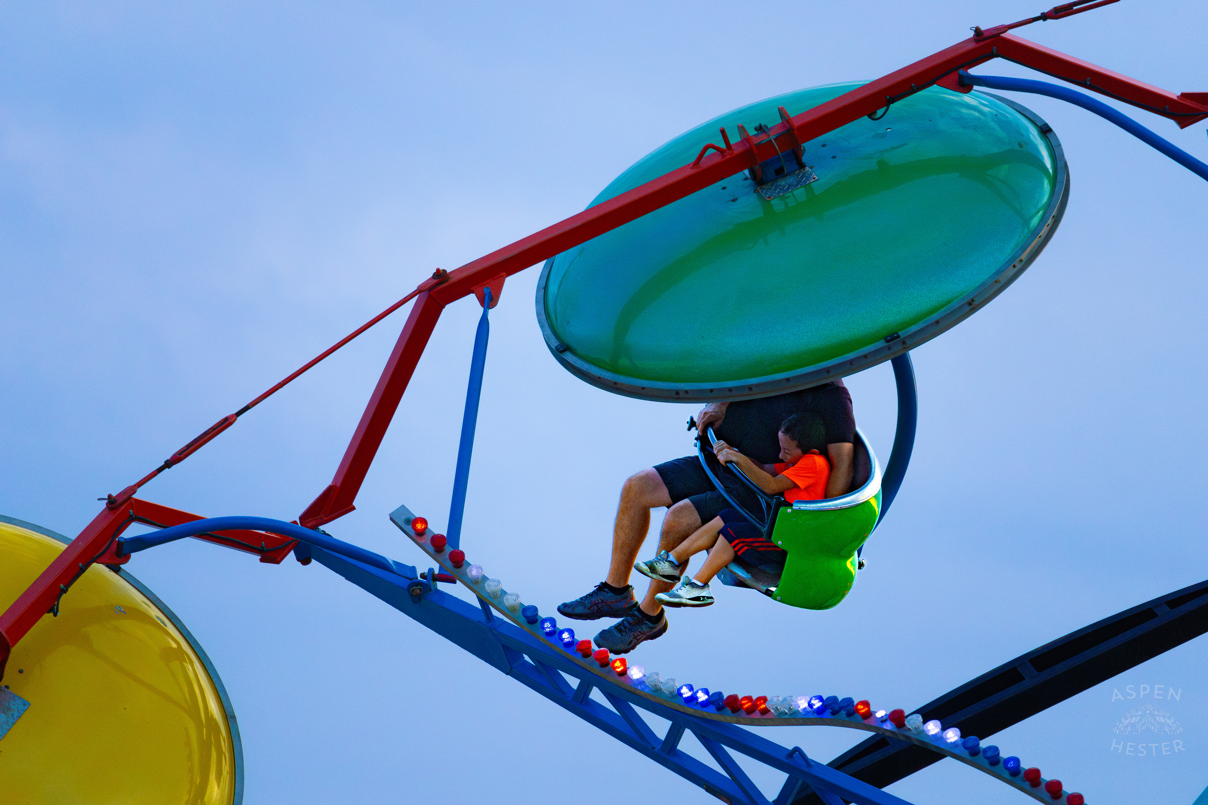 Fair Goers Spinning Around The Air on A Ride at The 120th Kentucky State Fair. July 15th, 2024/Aspen Hester