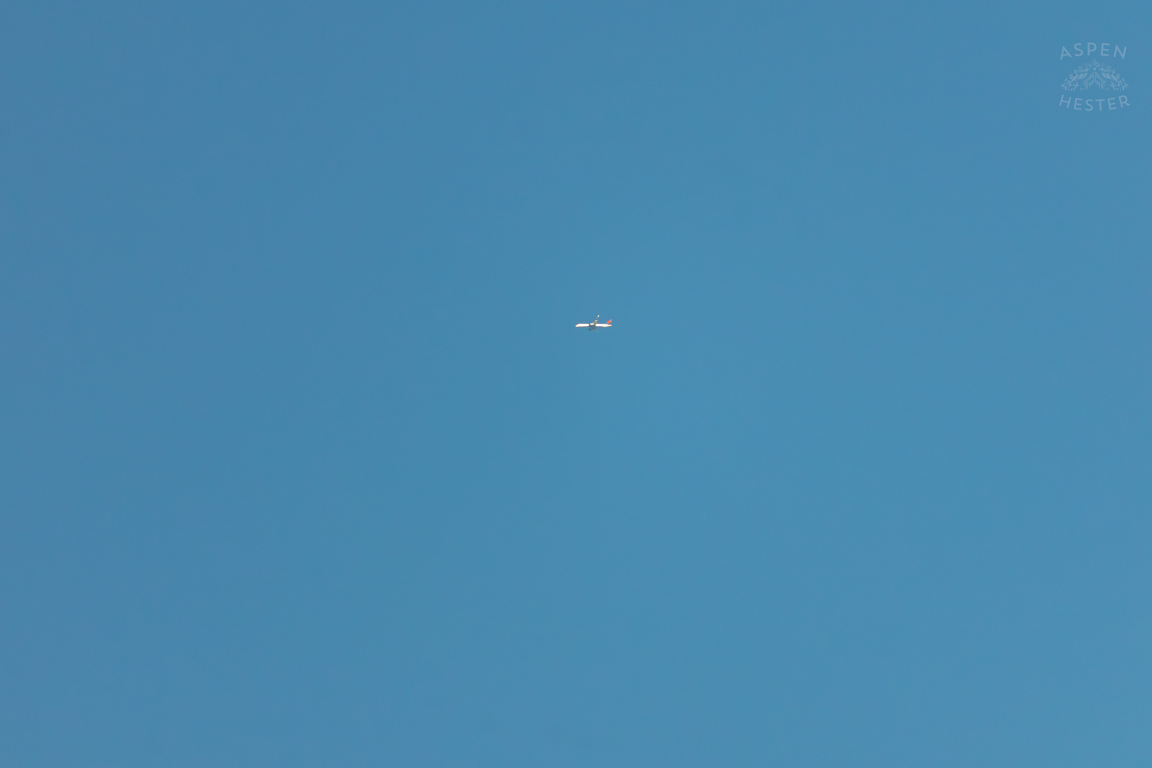 A Very Very Distant Airplane Flies Over Nulu on A Saturday Evening. November 14th, 2024/Aspen Hester