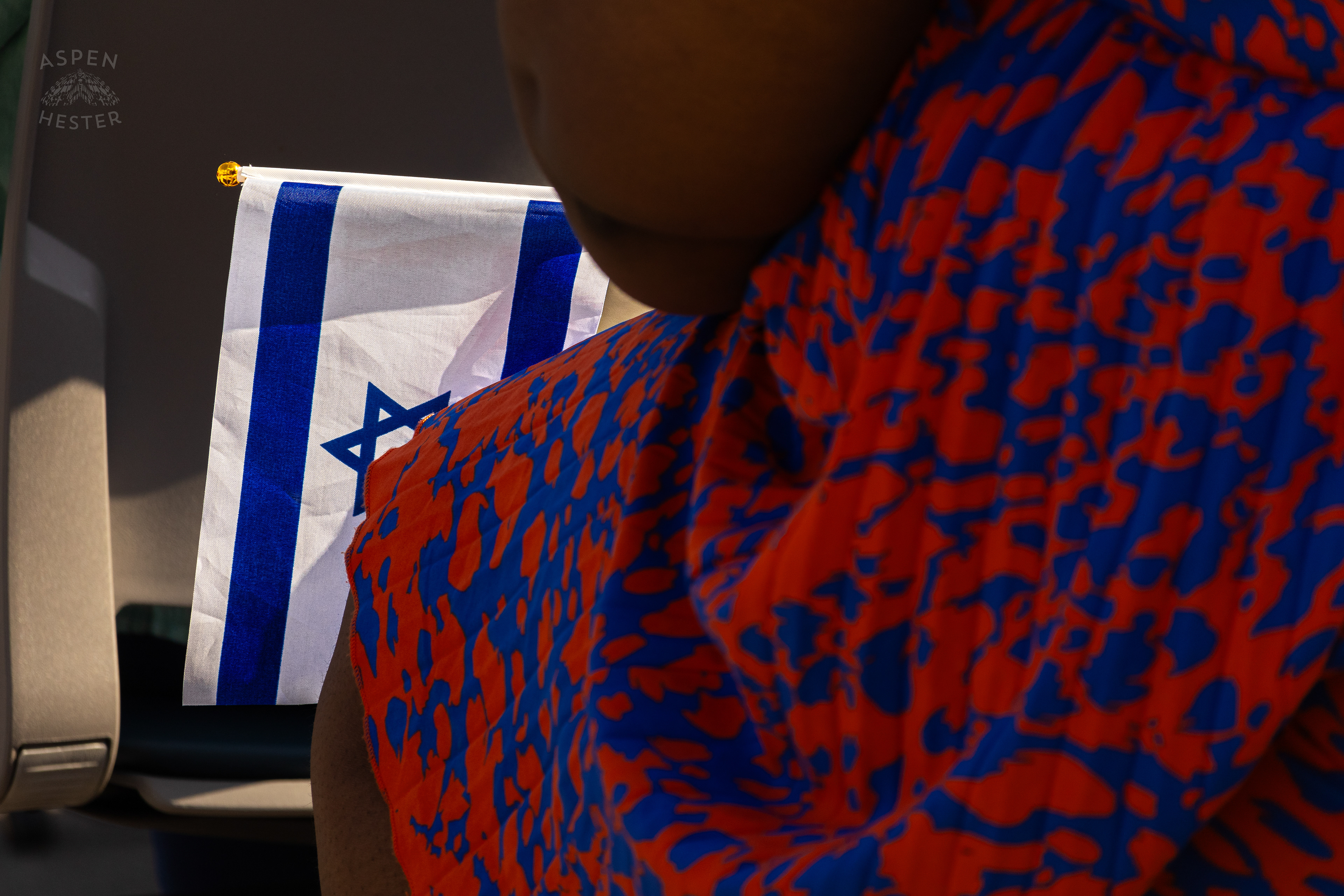 Someone Holds a Jewish Flag in The Crowd Gathered at The Trager Jewish Community Center to Remember The Victims and Pray for Peace One Year After The October 7th 2023 Hamas Attack. October 6th, 2024/Aspen Hester
