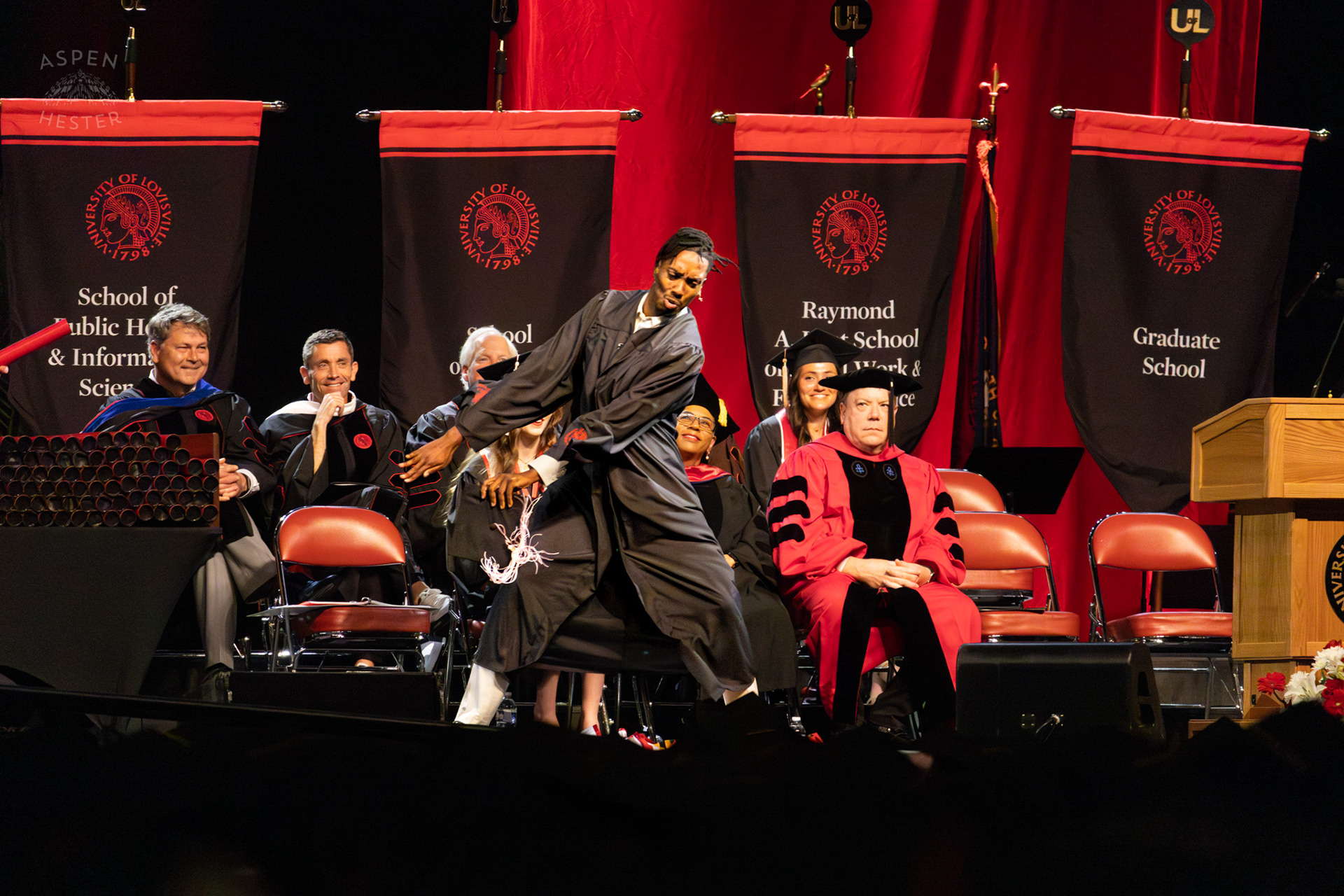 Student Celebrating at UofL's 2024 Spring Graduation. May 11th, 2024/Aspen Hester