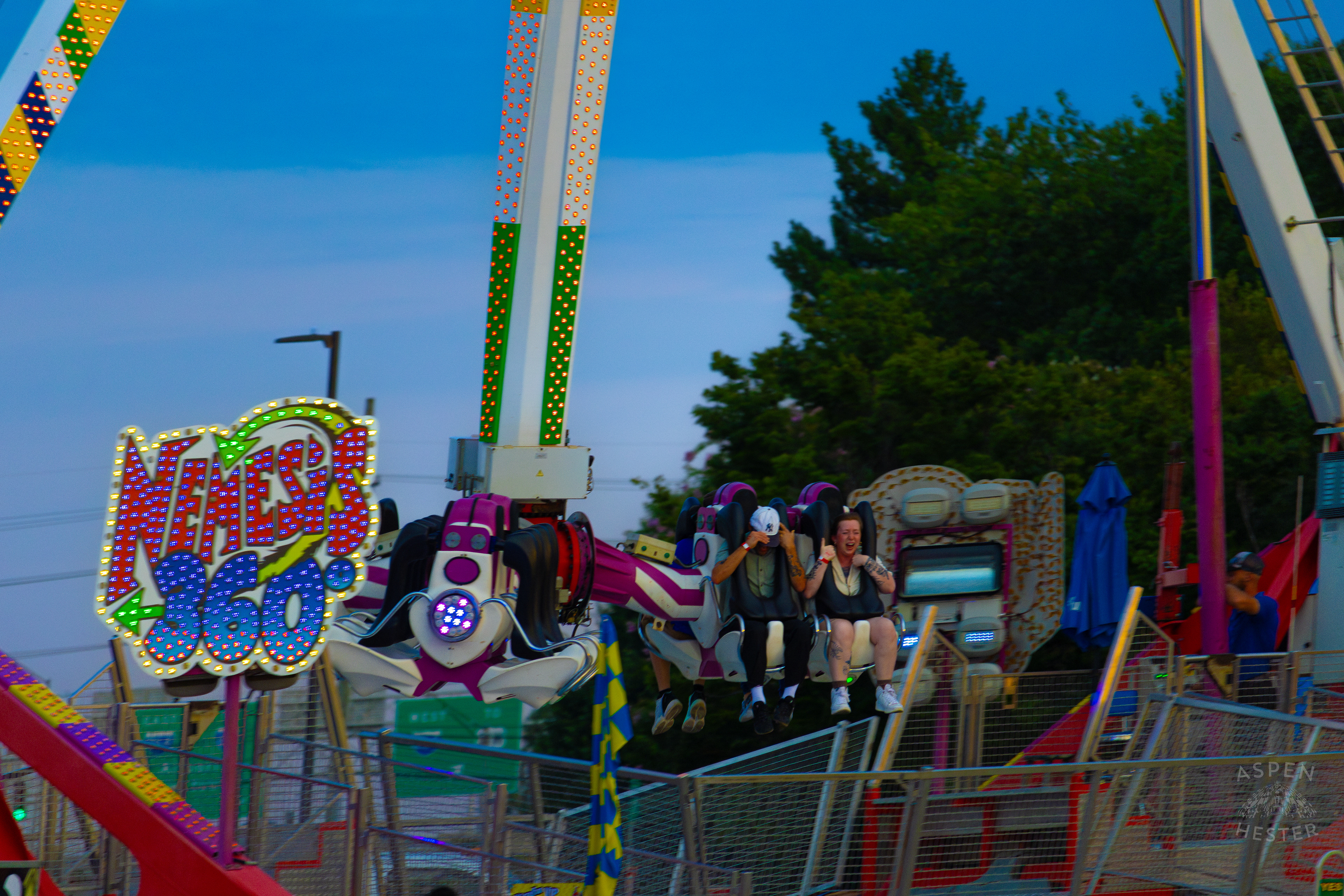Fair Goers Spinning Around The Sky in the Nemeses 360 at The 120th Kentucky State Fair. July 15th, 2024/Aspen Hester