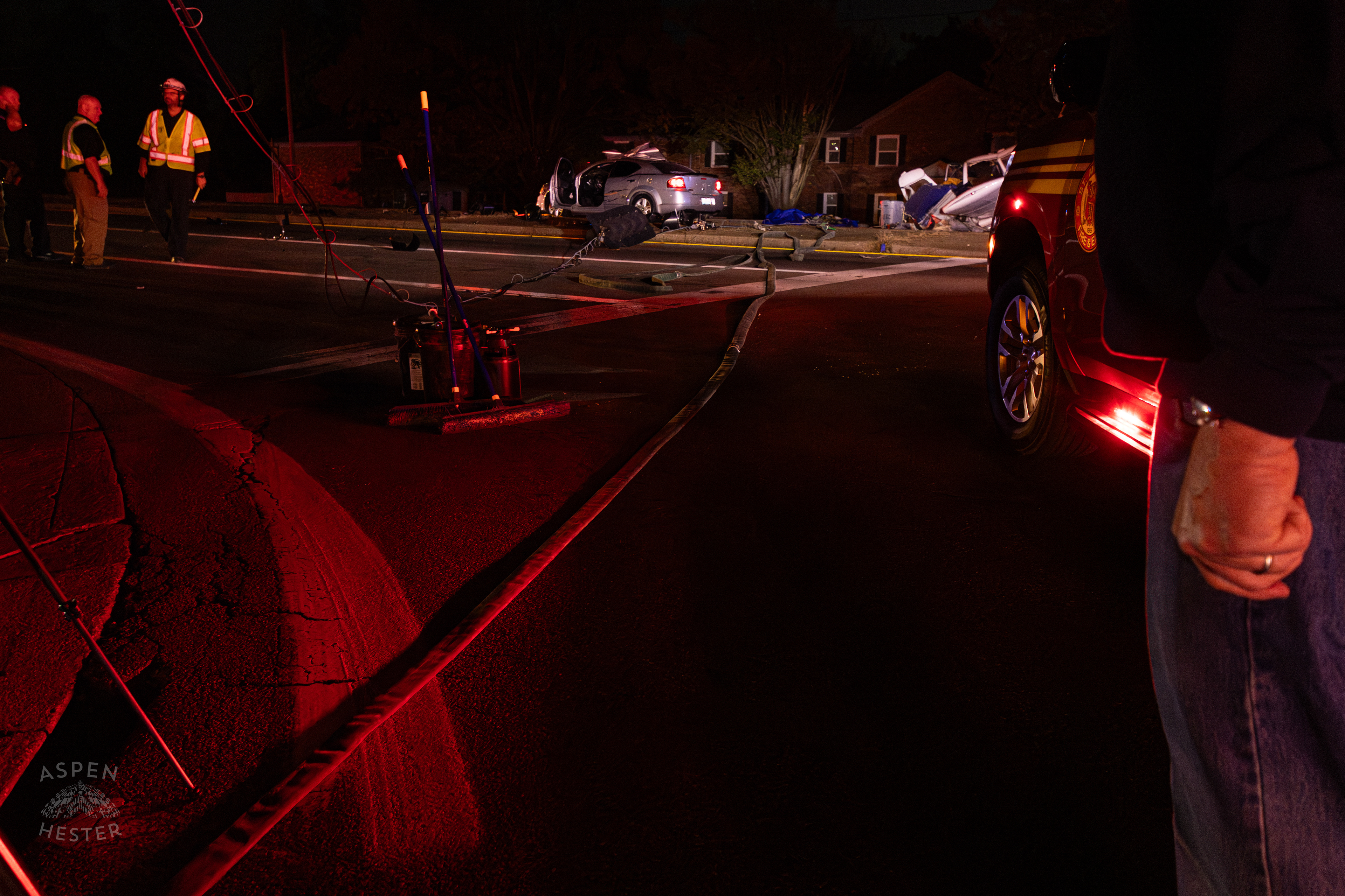 St. Matthews Fire and EMS Battalion Chief Watches Over The Scene Where A Piper Cherokee Plane Crash Landed, Taking Out Utility Poles, and Hitting A Car on Breckenridge Lane and Kresge Way. October 11th, 2024/Aspen Hester 