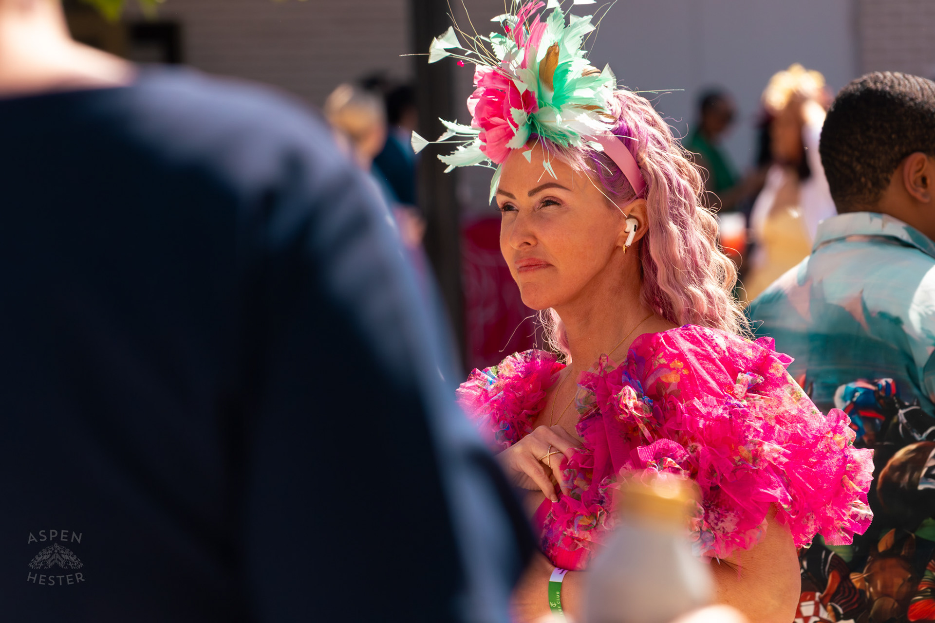 Bright Pink and Teal Fashion Near The Churchill Downs Grand Stands During Thurby. April 30th, 2026/Aspen Hester