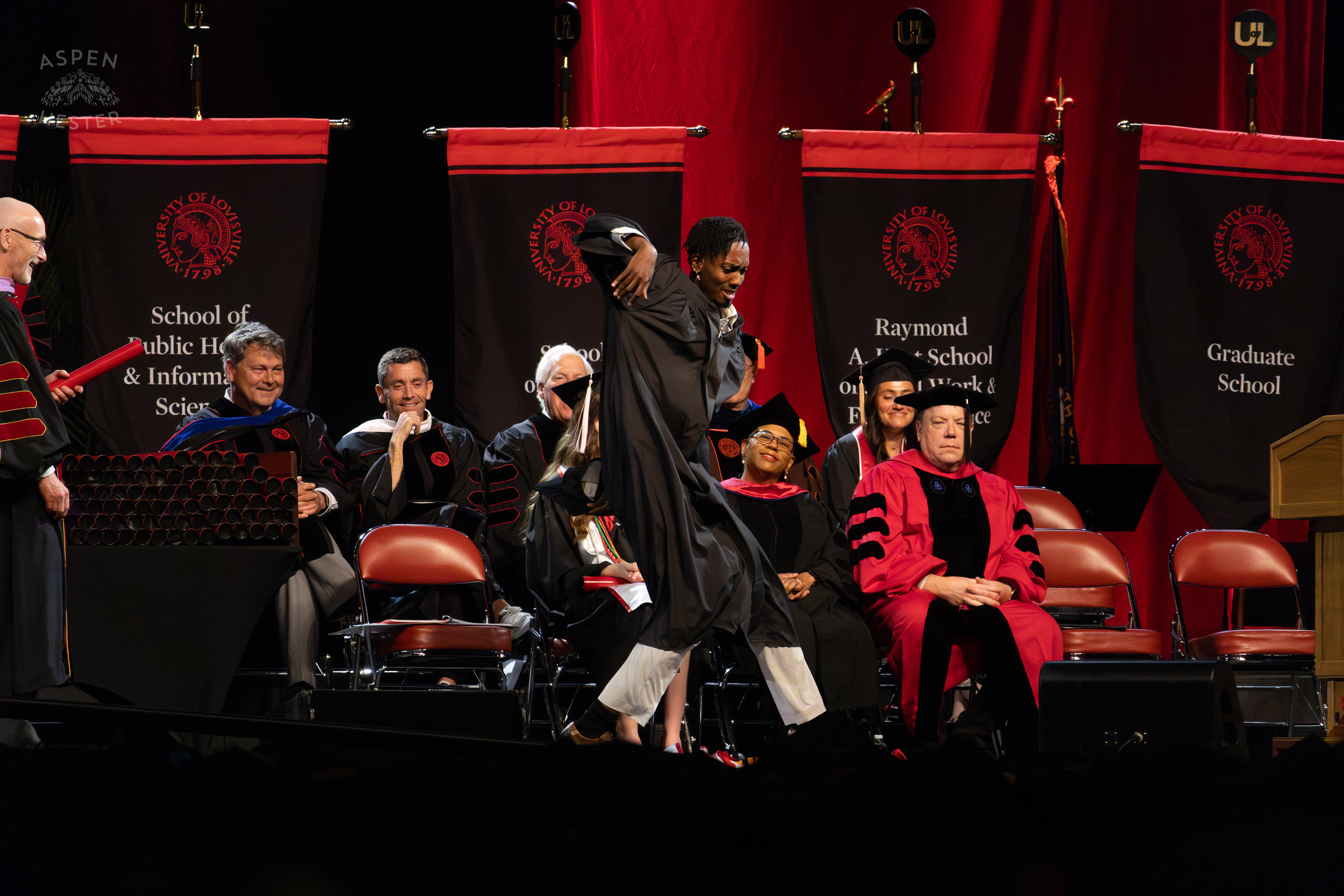 Student Celebrating at UofL's 2024 Spring Graduation. May 11th, 2024/Aspen Hester