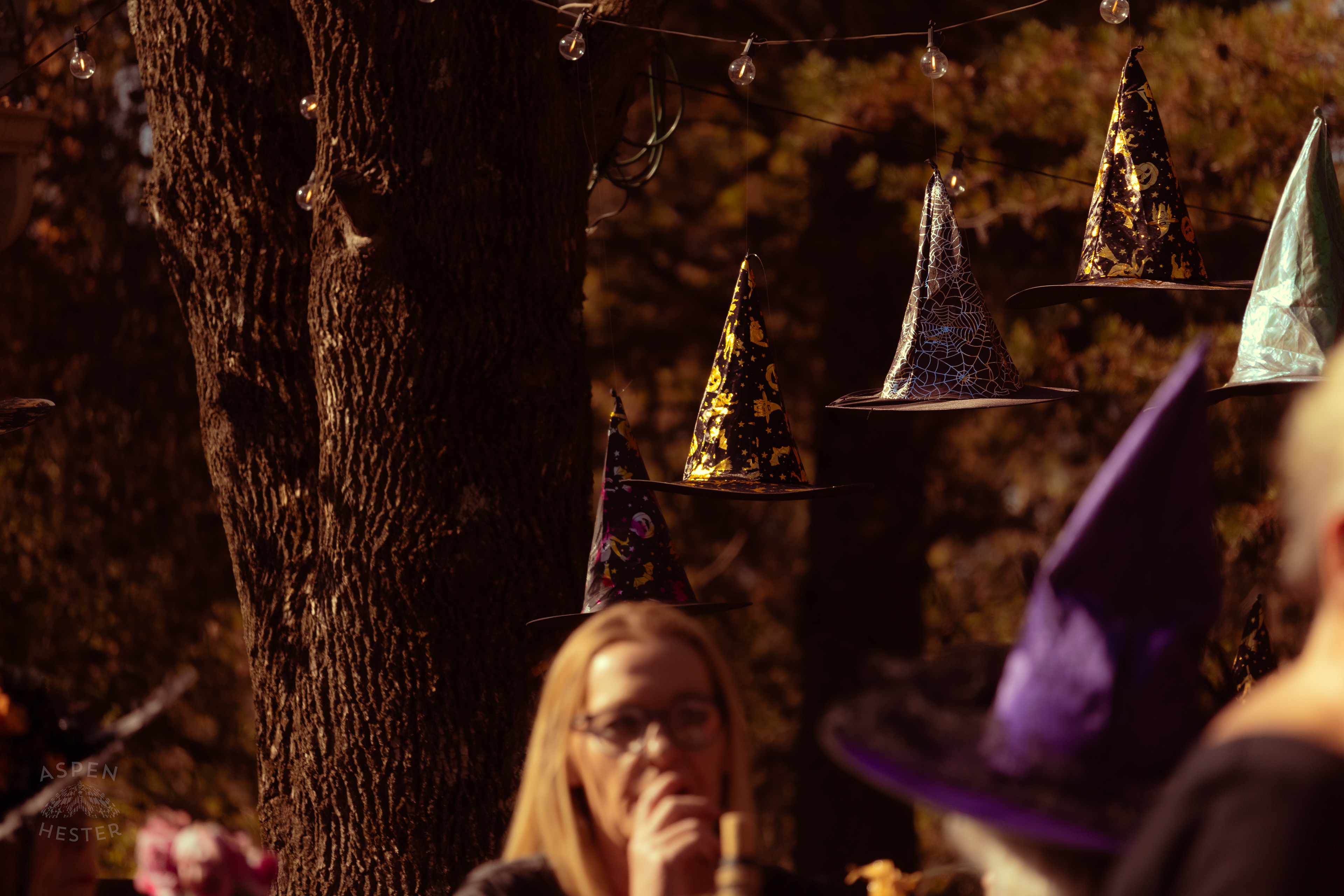Witch Hats Floating Above Dozens of Women Attending Stacey Edrington’s Yearly Witches Brunch in Mt. Washington. October 26th, 2024/Aspen Hester