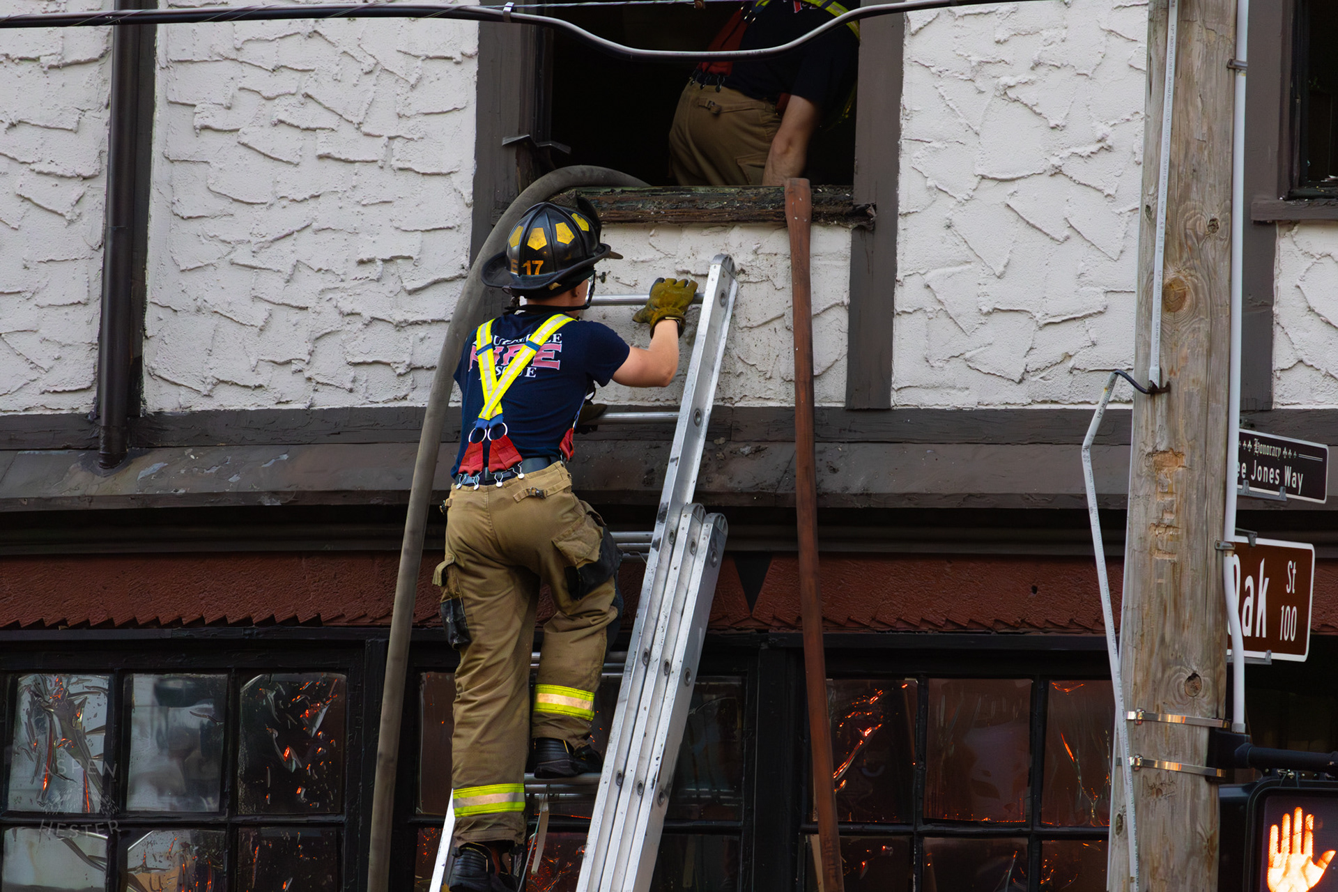 Louisville Firefighter Entering Building on The Corner of 2nd and Oak Street. June 7th, 2024/Aspen Hester