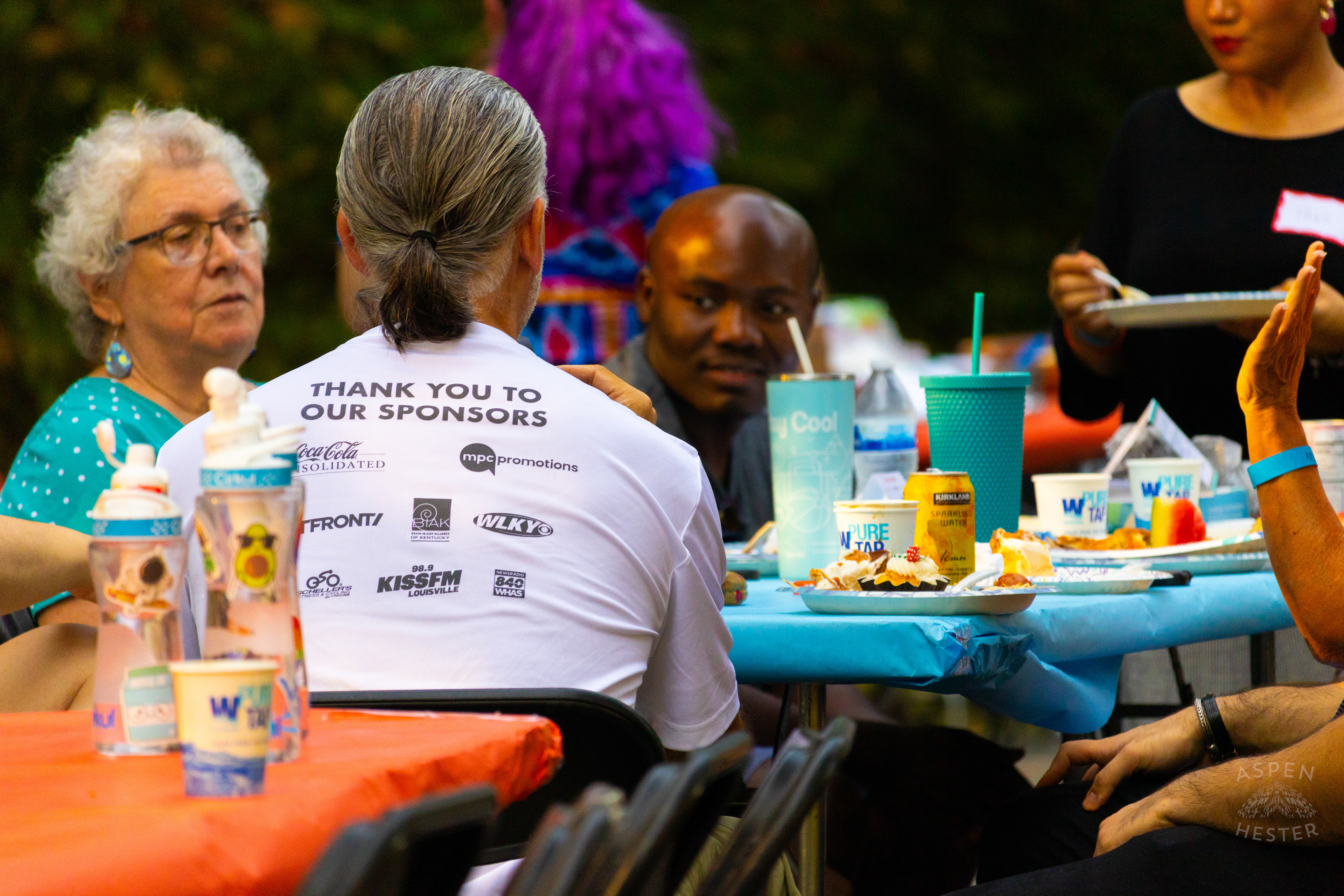 Community Members Eating from The Big Table at Iroquois Park. September 15th, 2024/Aspen Hester