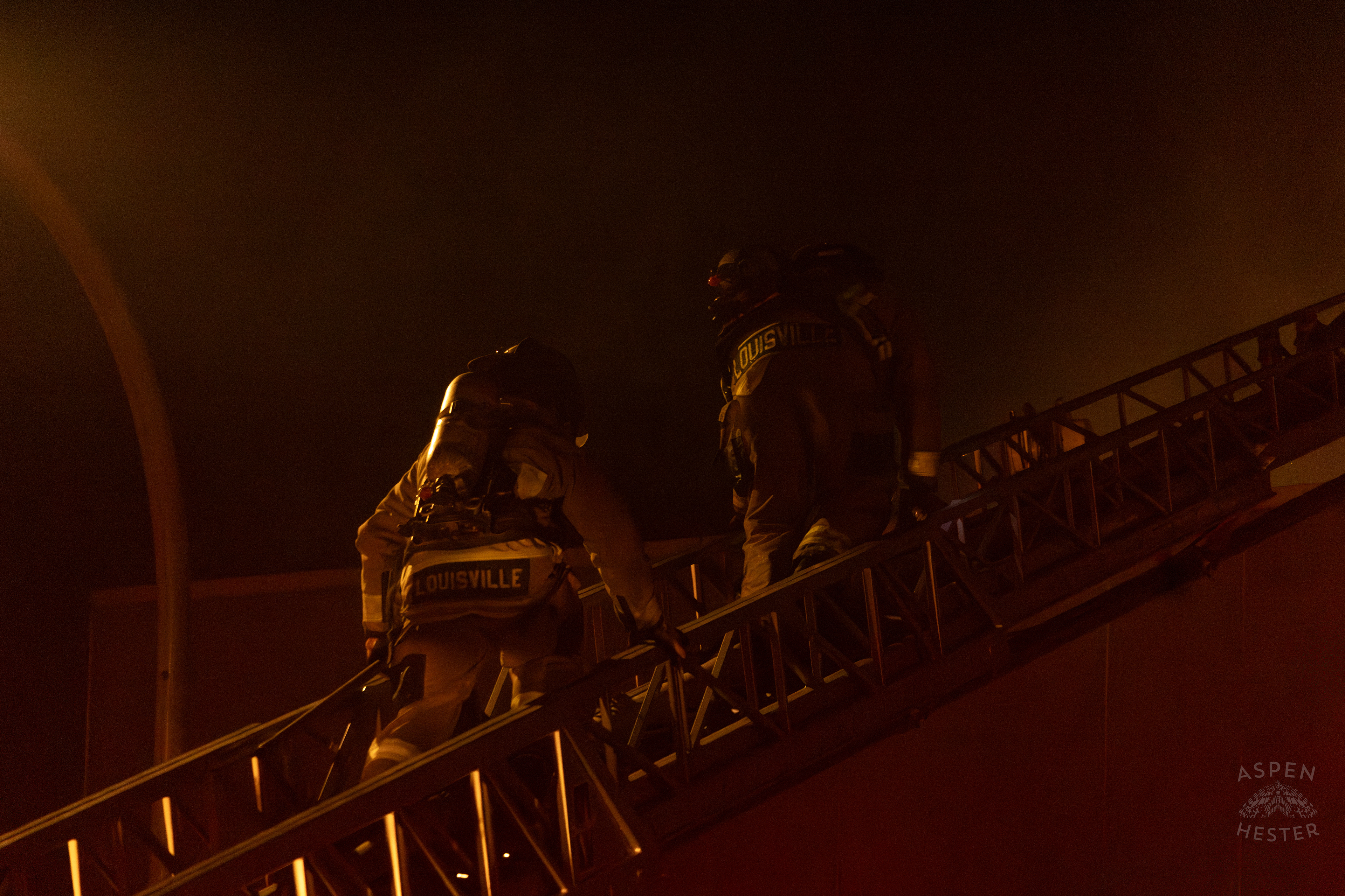 Firefighters Climbing an Aerial to Battle the Massive 3 Alarm Blaze Engulfing The Vacant St. Paul's German Evangelical Church on East Broadway. October 9th, 2024/Aspen Hester