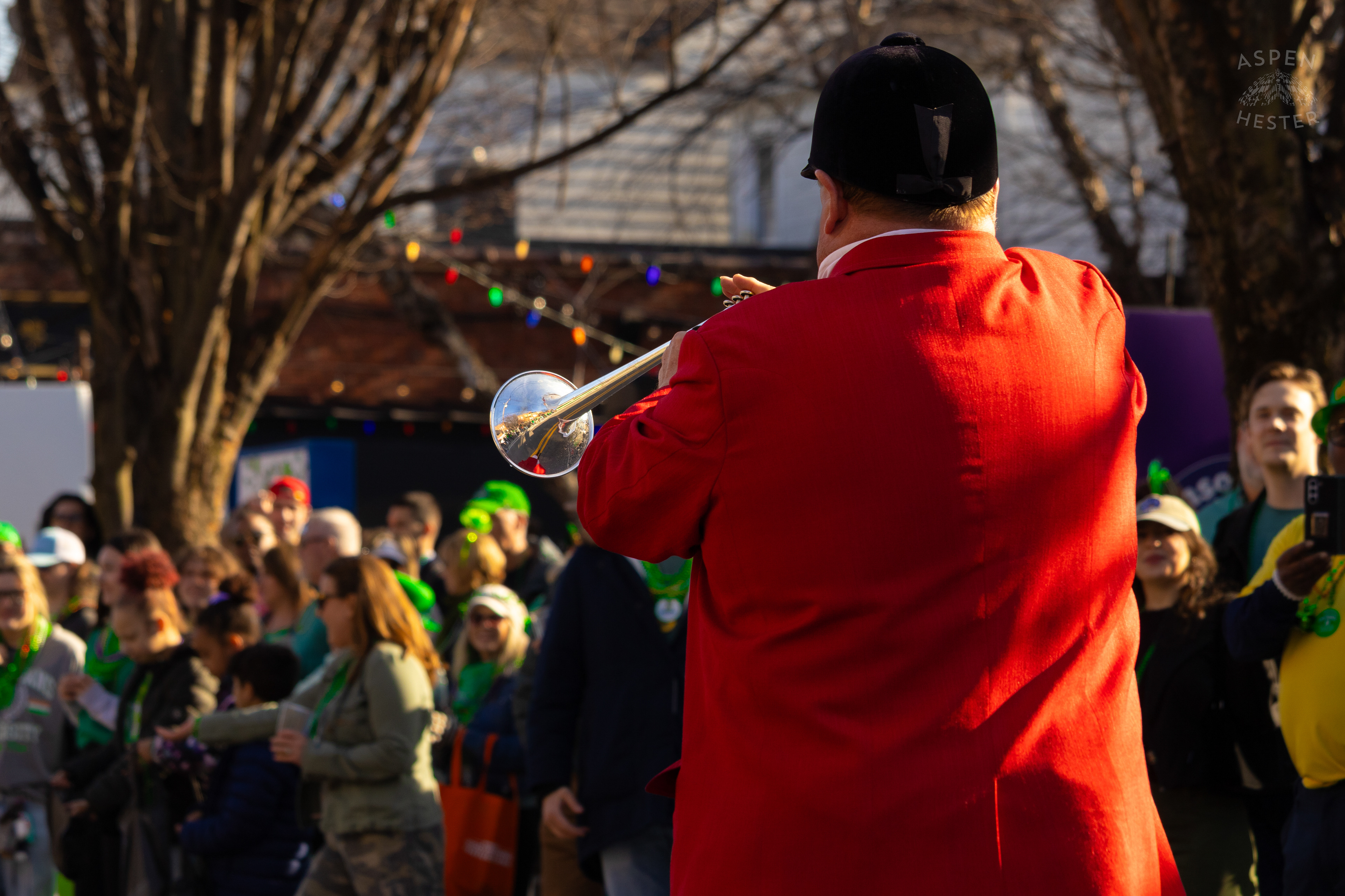 Churchill Downs’ Steve Buttleman Stop to Play The Call To Post as The 52nd Annual Saint Patrick’s Day Parade Rolls Through The Highlands. March 8th, 2025/Aspen Hester