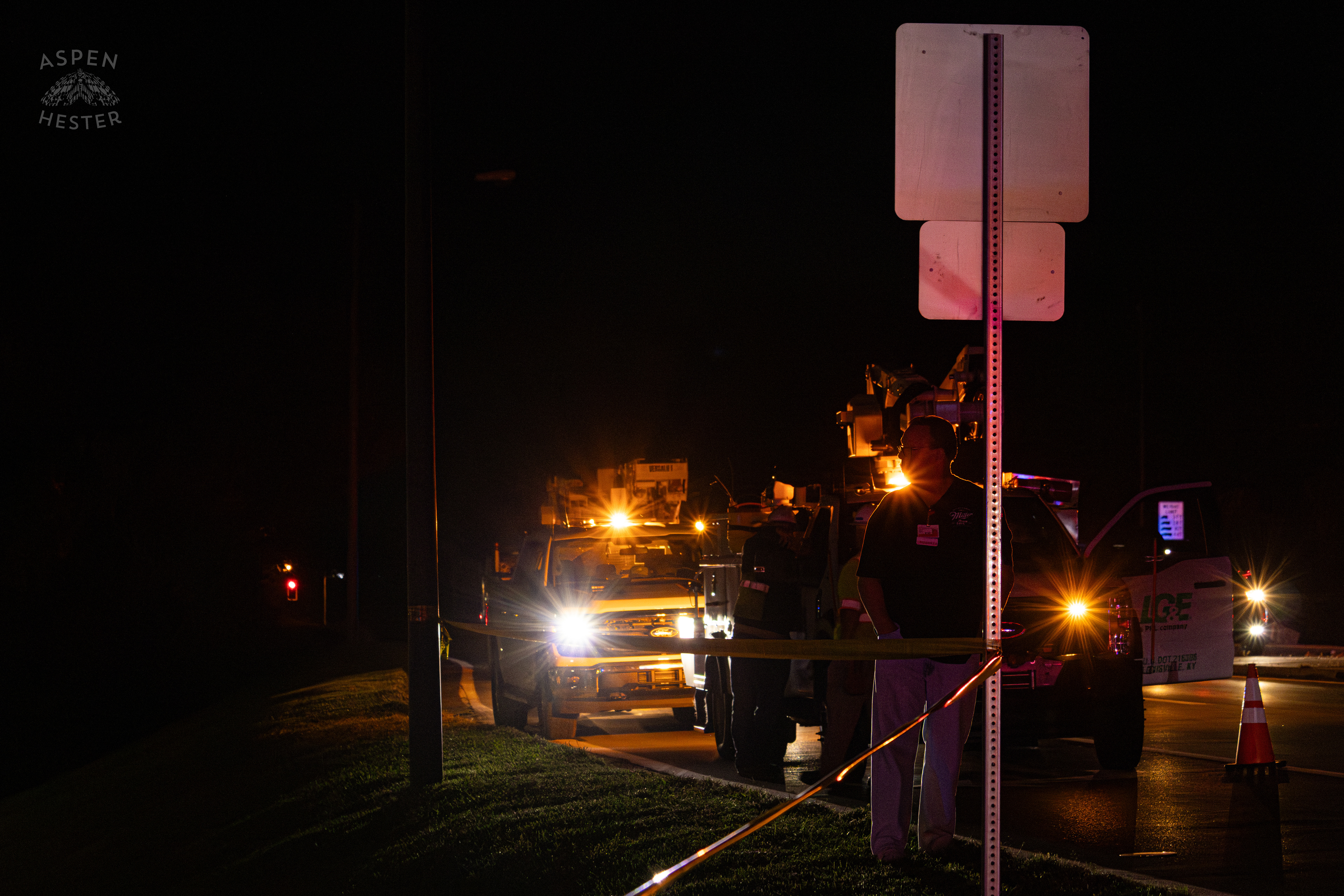 LG&E Workers and Bucket Trucks on Standby after A Piper Cherokee Plane Crash Landed, Taking Out Utility Poles, and Hitting A Car on Breckenridge Lane and Kresge Way. October 11th, 2024/Aspen Hester 