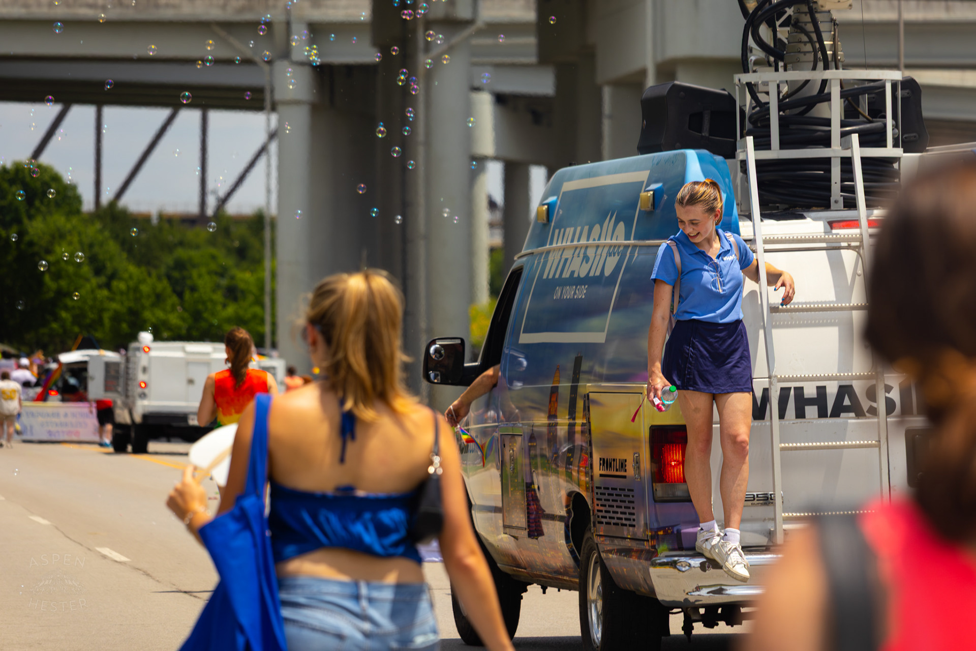 WHAS-11’s Clarice Scheele Catches A Break On The Back of The Satellite Truck During The Annual Parade at Kentuckiana Pride 2025. June 21th, 2025/Aspen Hester 