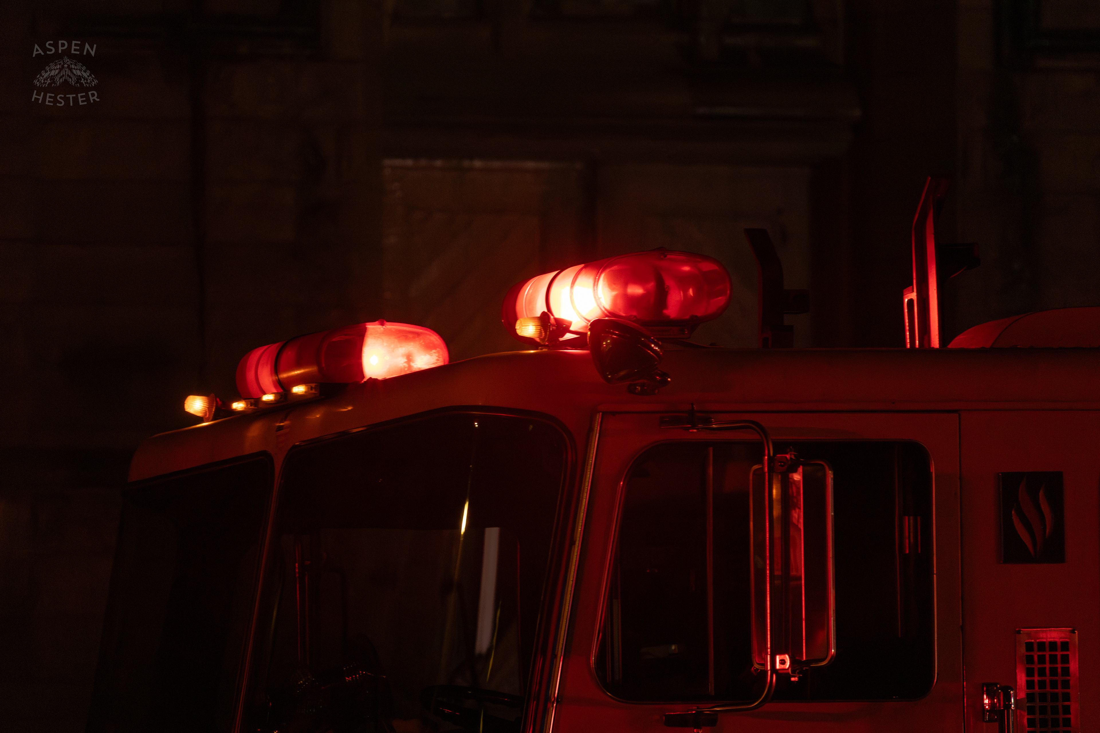 Fire Truck’s Flashing Lights Alerting of The Scene of a Massive 3 Alarm Blaze Engulfing The Vacant St. Paul's German Evangelical Church on East Broadway. October 9th, 2024/Aspen Hester