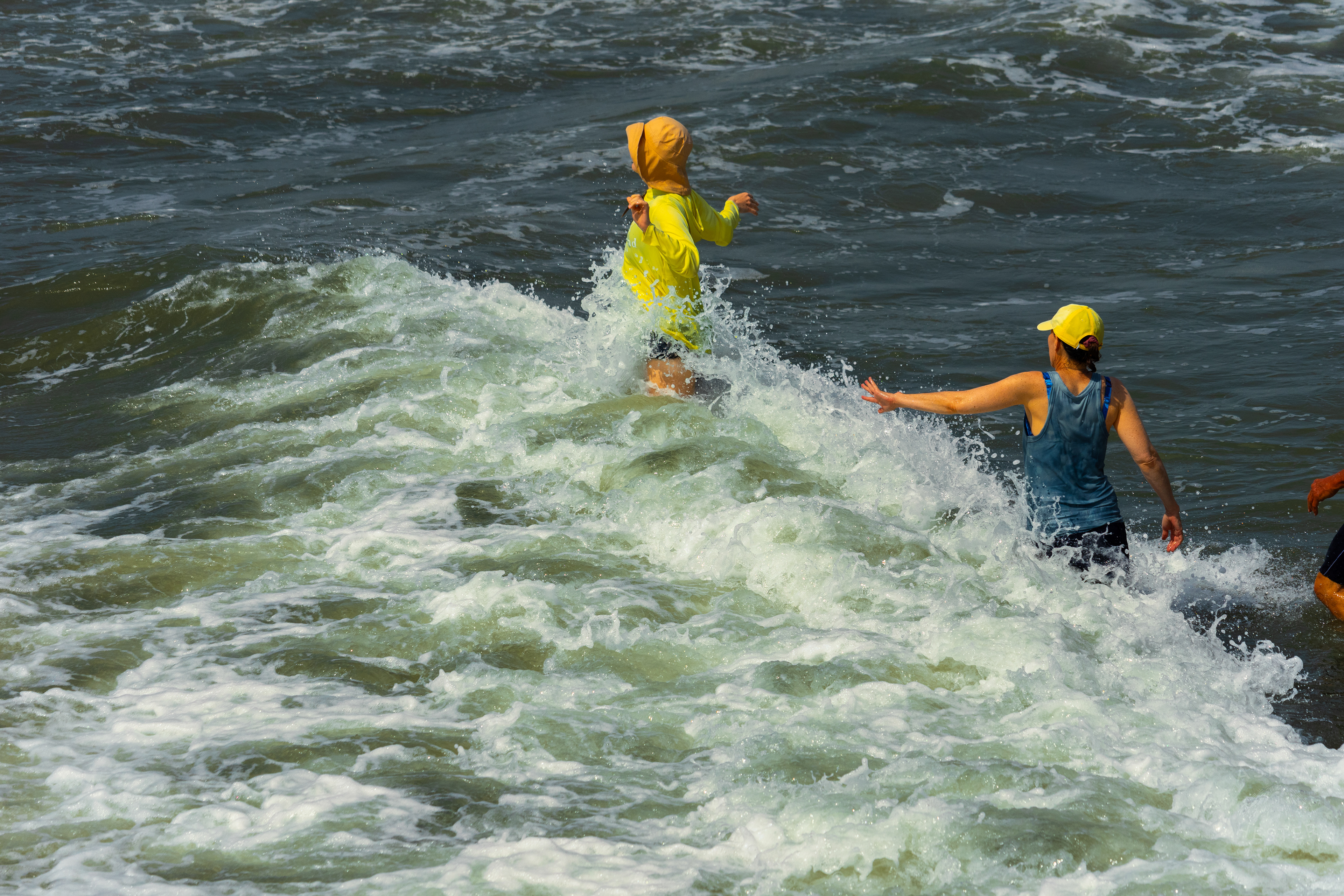 People Splashing in The Waves on Tybee Island Georgia. June 27th, 2024/Aspen Hester