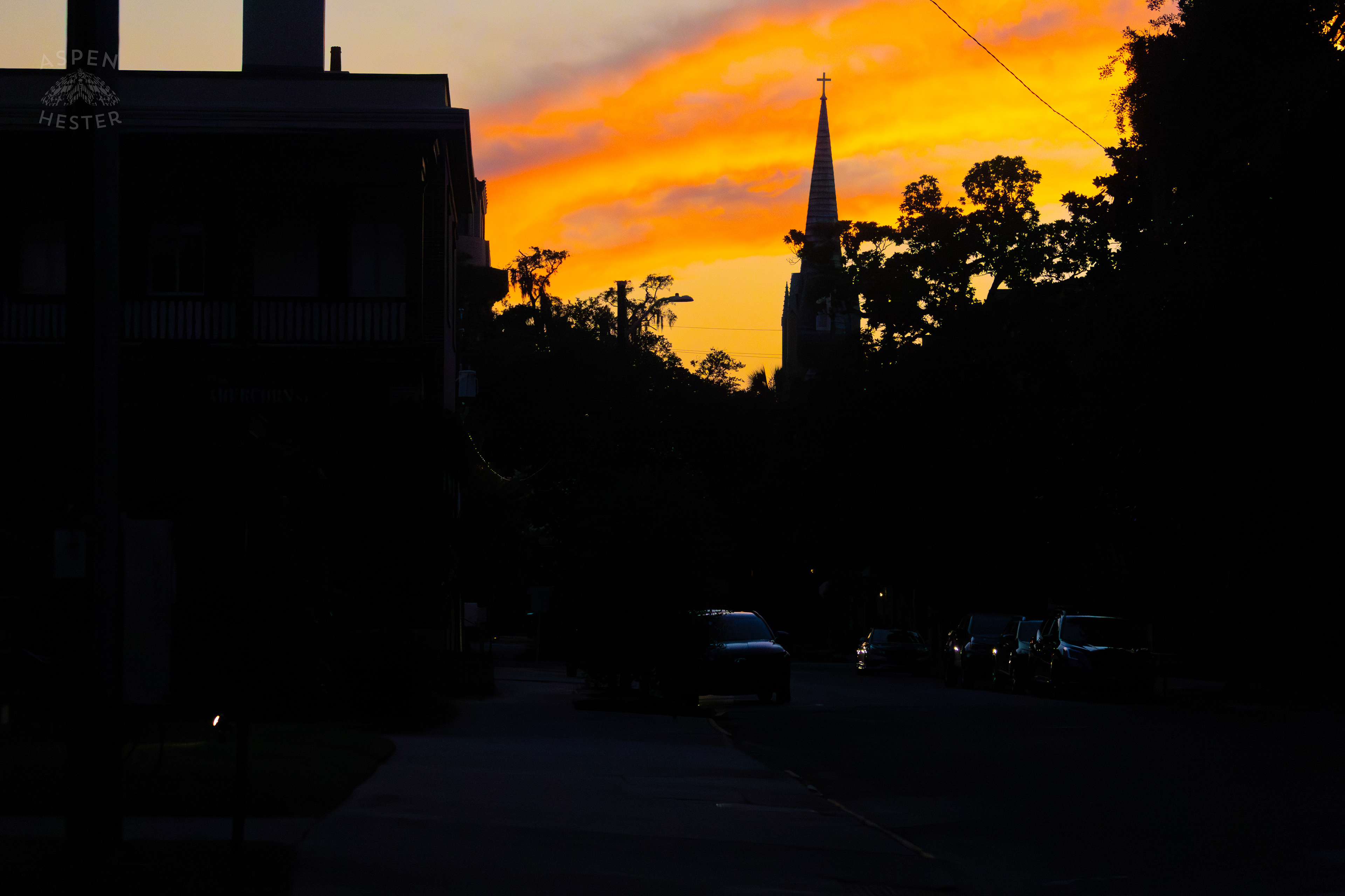 Steeple Against The Fiery Sunset In Savannah Georgia. June 24th, 2024/Aspen Hester
