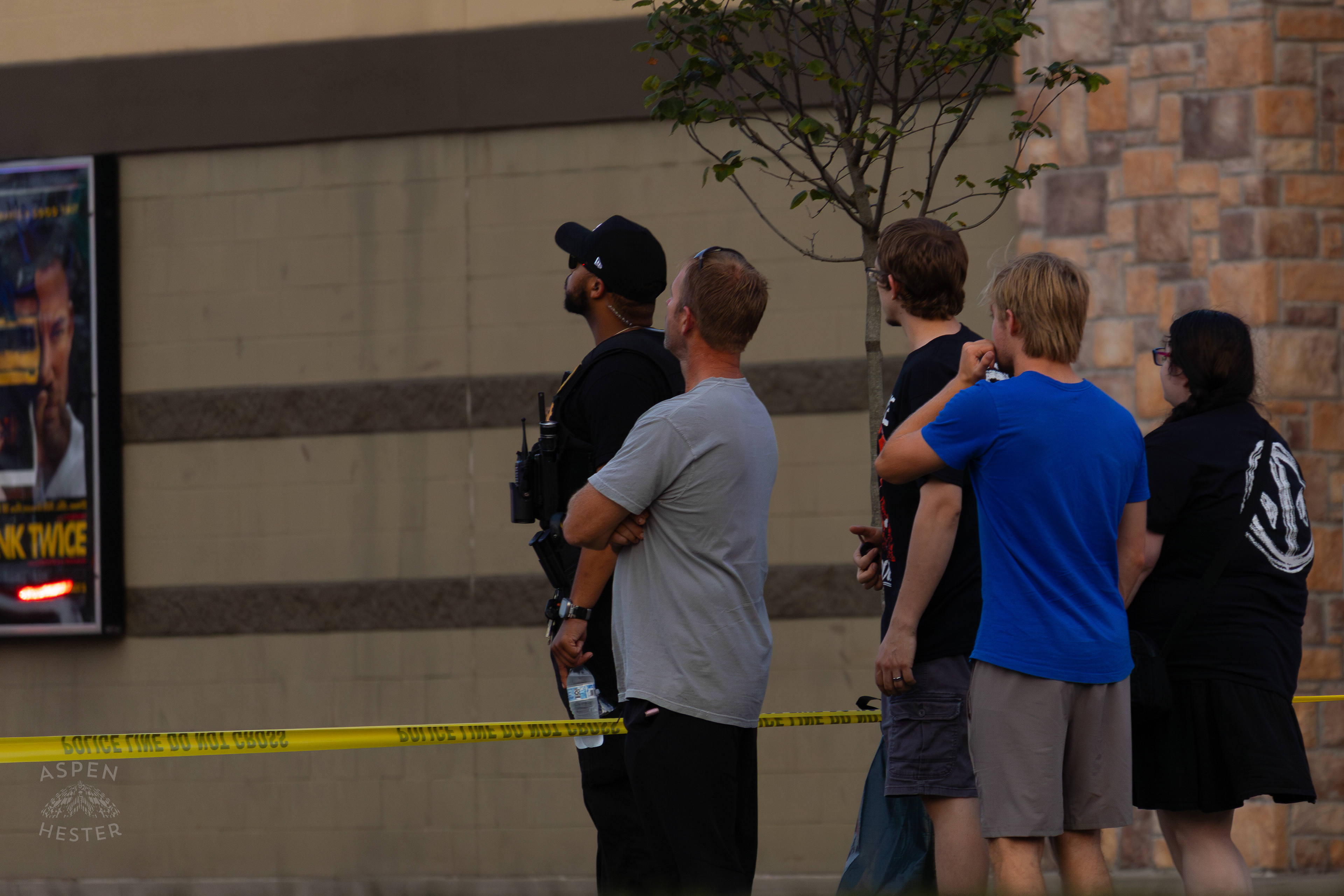 Witnesses Describing What They Saw to A Police Officer At The Scene Where A Man Shot Himself in The Head During A Police Stop Outside Mall St. Matthews. July 27th, 2024/Aspen Hester