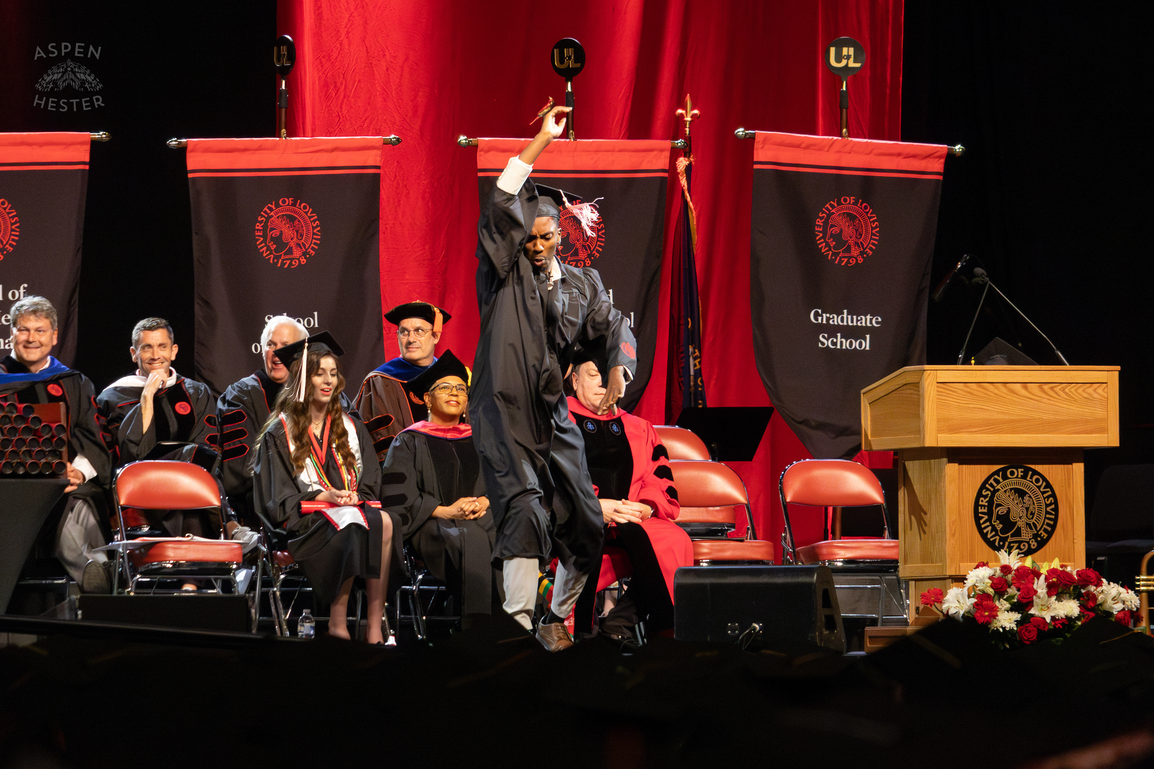 Student Celebrating at UofL's 2024 Spring Graduation. May 11th, 2024/Aspen Hester