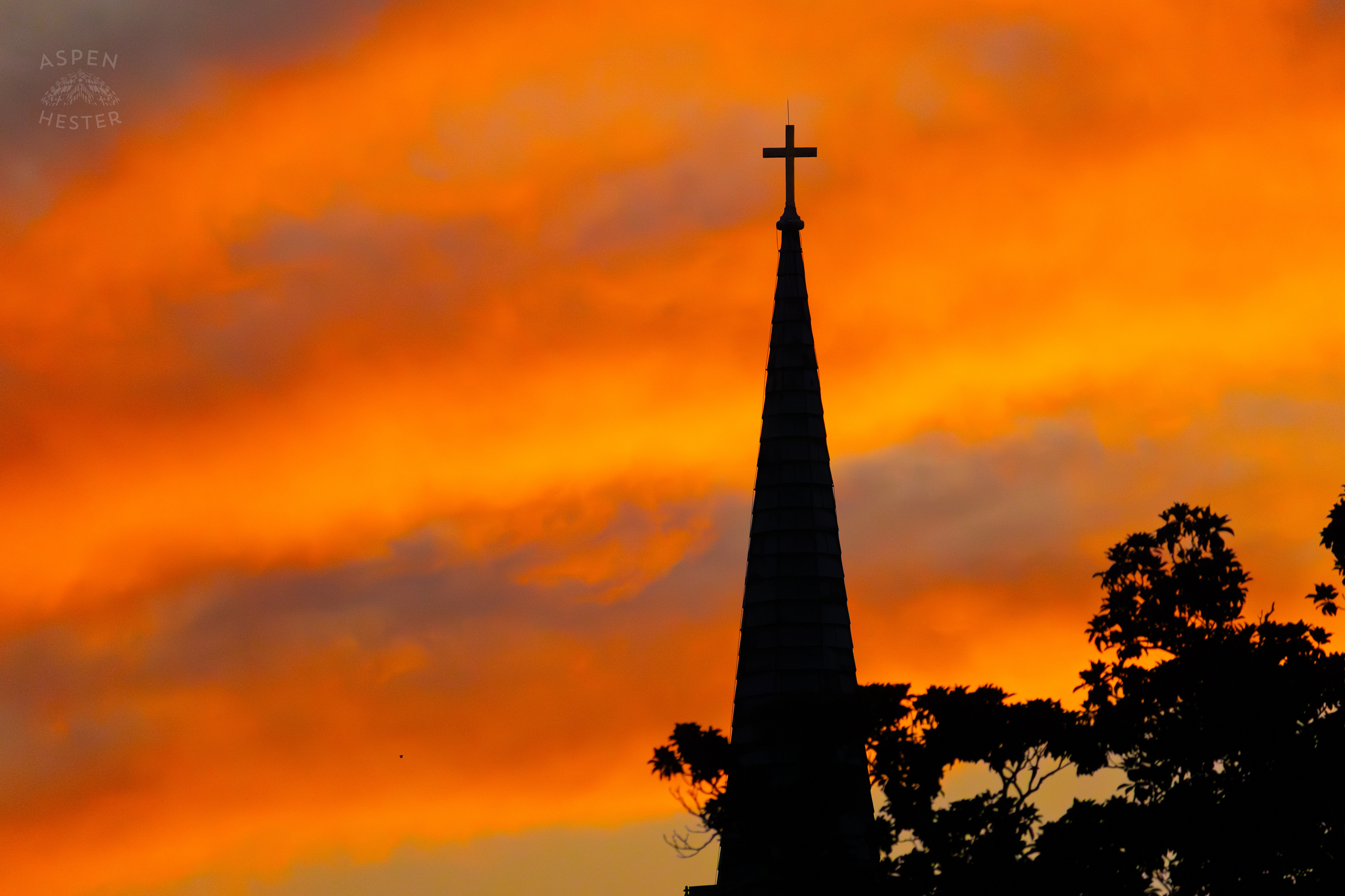 Steeple Against The Fiery Sunset In Savannah Georgia. June 24th, 2024/Aspen Hester
