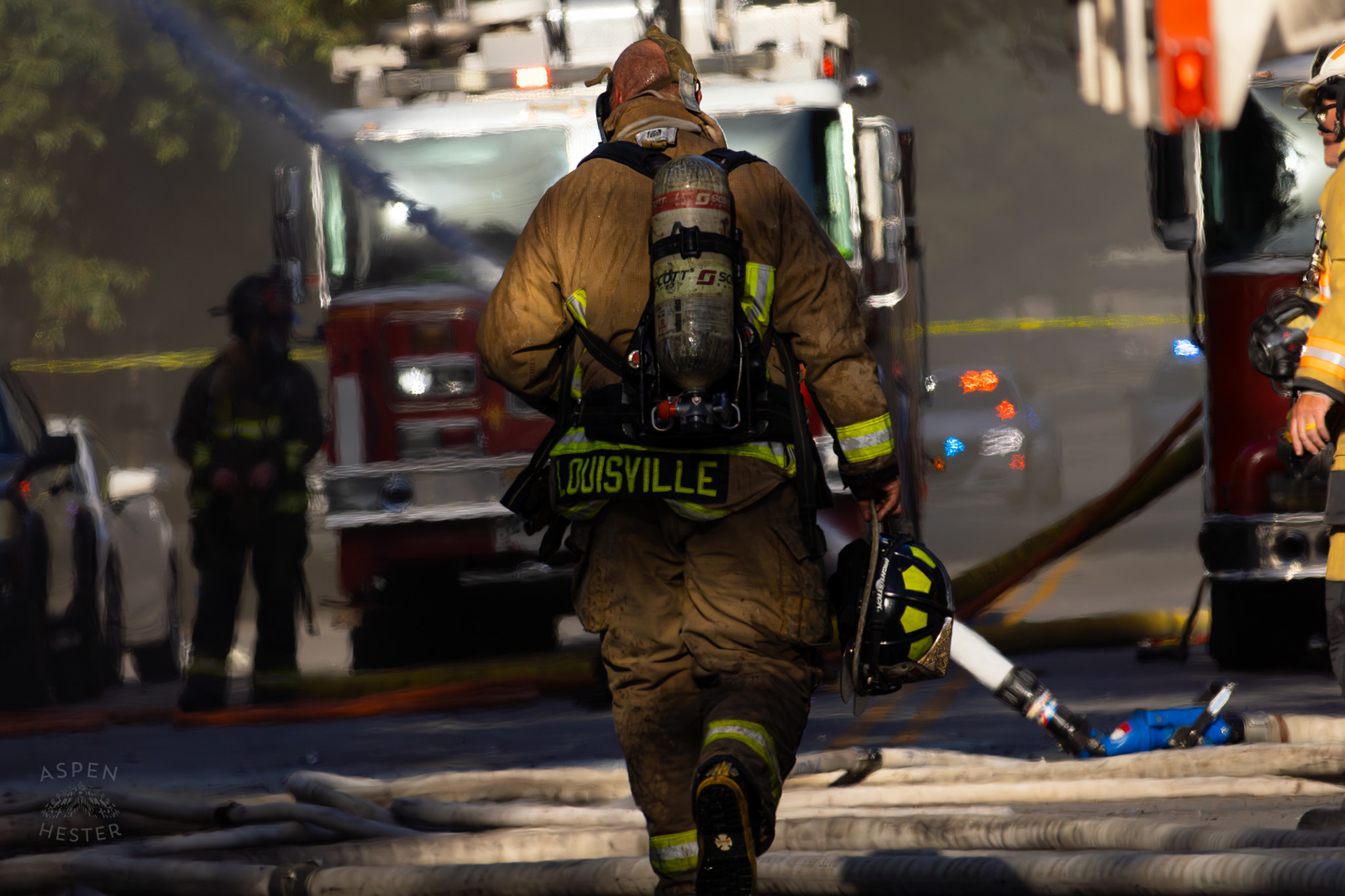 Louisville Firefighter Battling Flames on The Corner of 2nd and Oak Street. June 7th, 2024/Aspen Hester