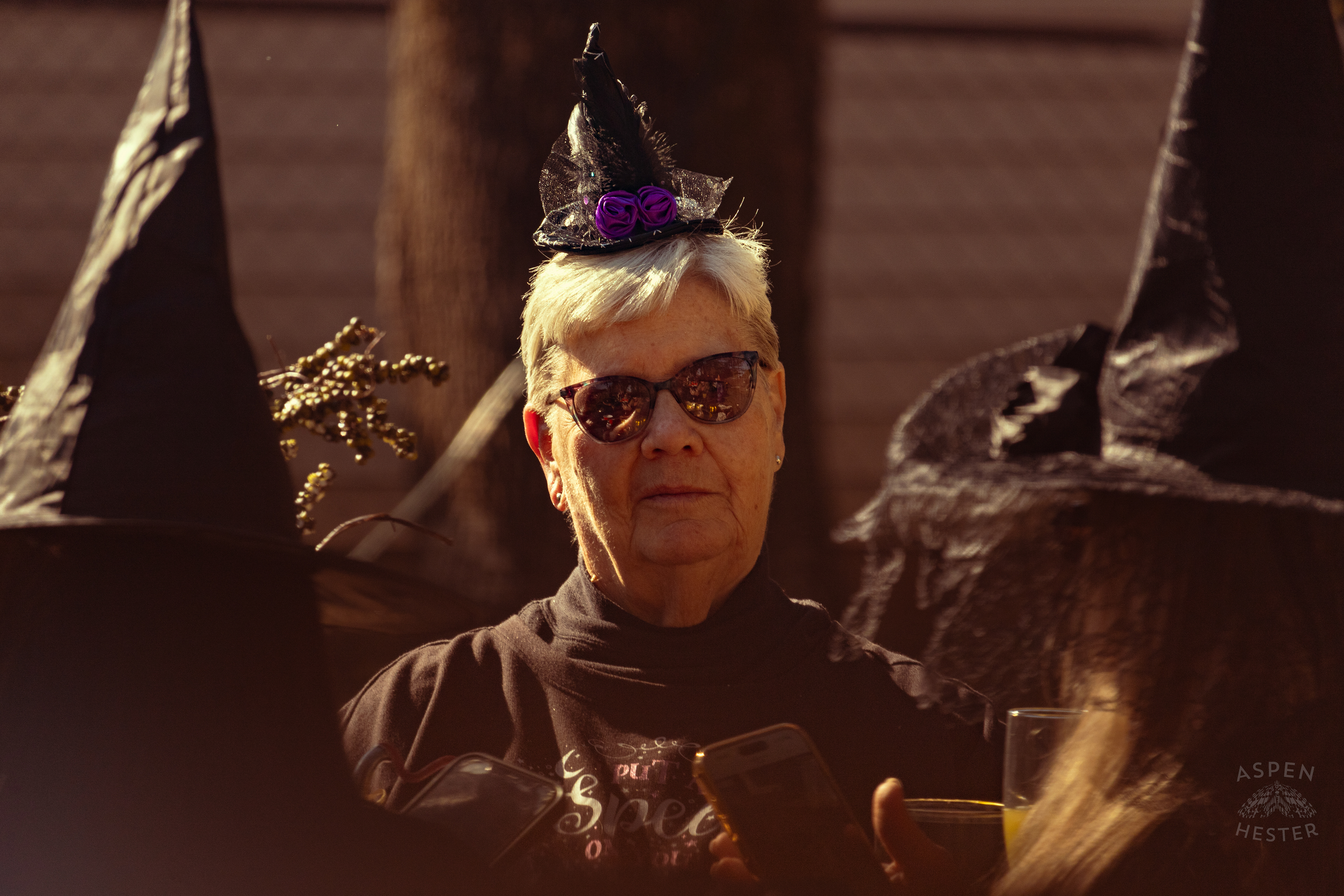 Witch Looking Right into The Camera at Stacey Edrington’s Yearly Witches Brunch in Mt. Washington. October 26th, 2024/Aspen Hester