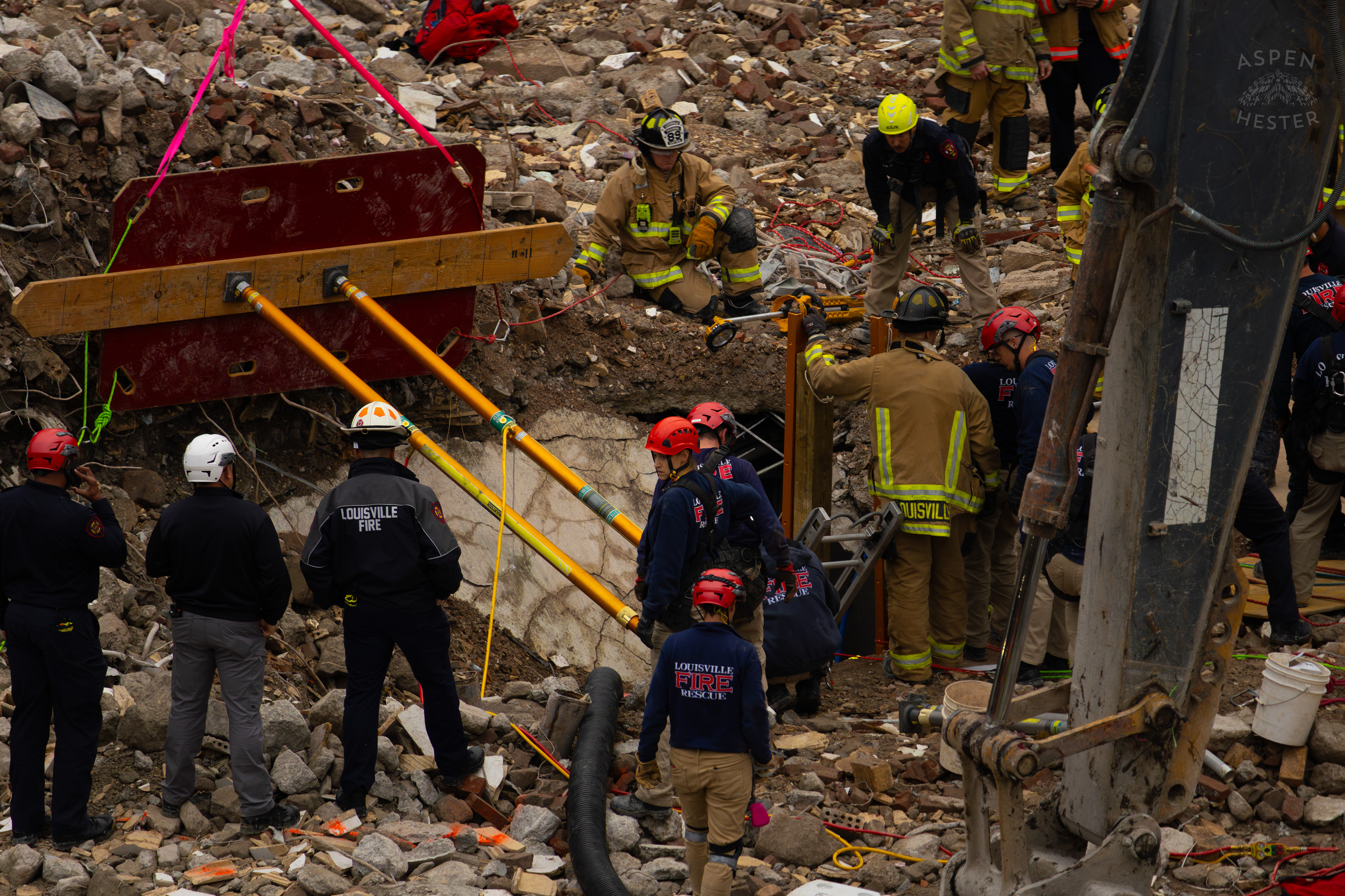 Massive Shoring Holds Back Rubble as Crew Members Anxiously Watch the 8+ Hour LFD Effort to Free A Trapped Demo Worker. November 11th, 2024/Aspen Hester