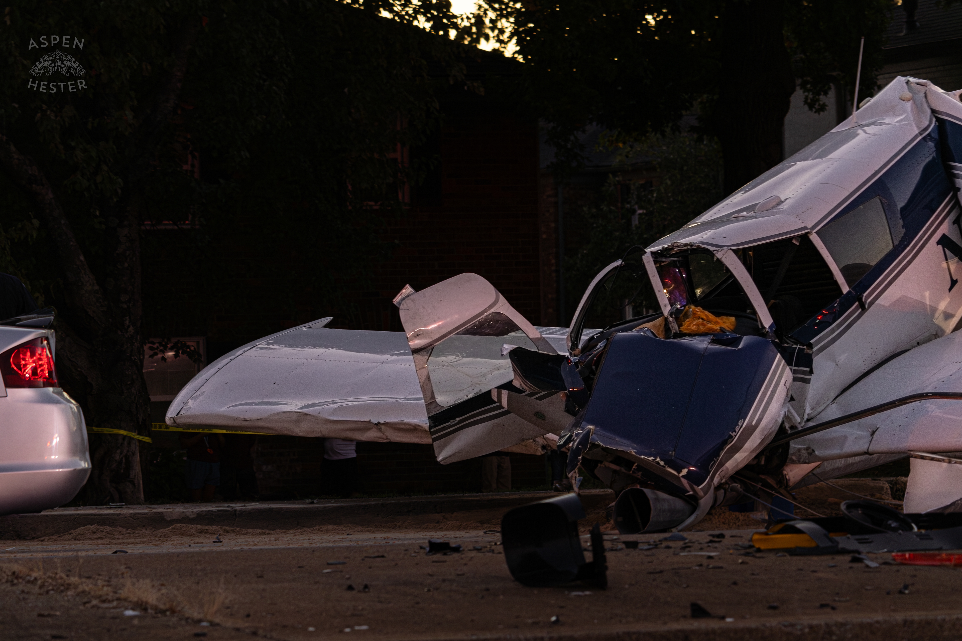 The Piper Cherokee Plane Crumpled after it Crash Landed, Taking Out Utility Poles, and Hitting A Car on Breckenridge Lane and Kresge Way. October 11th, 2024/Aspen Hester 