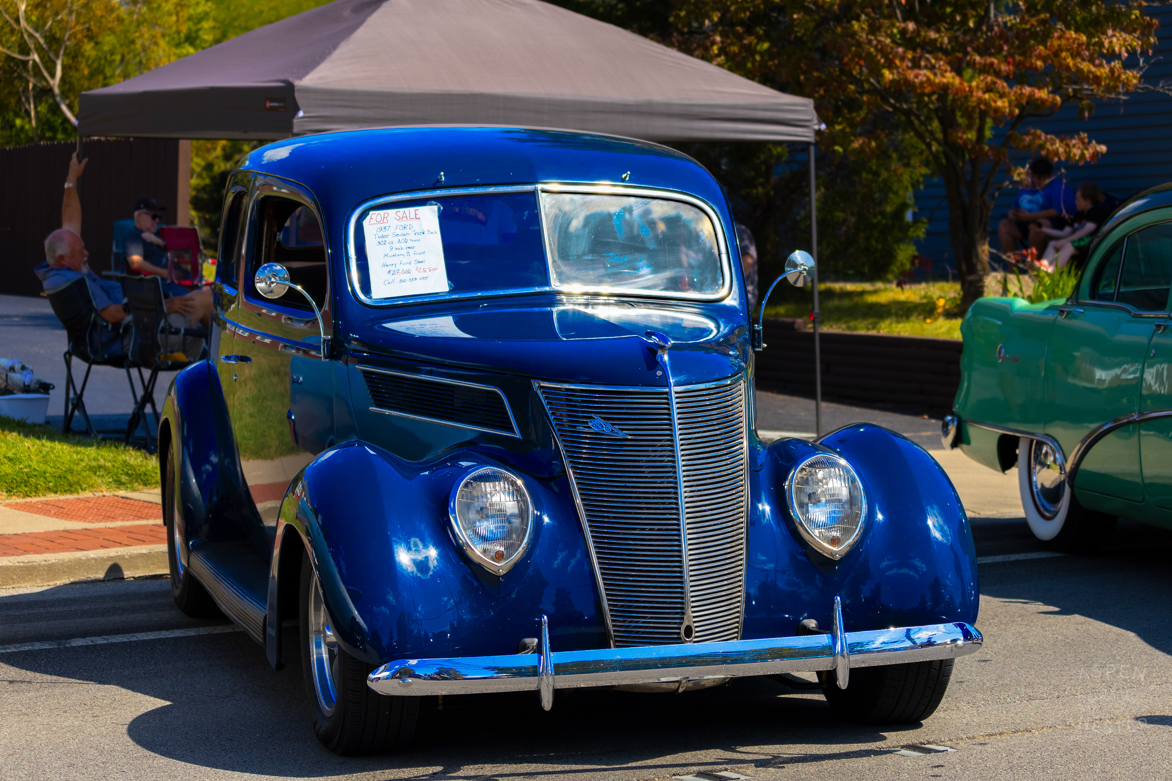 A Navy 1937 Ford Tudor Sedan on Display and for Sale at The 2024 Jeffersontown Gaslight Festival. September 15th, 2024/Aspen Hester