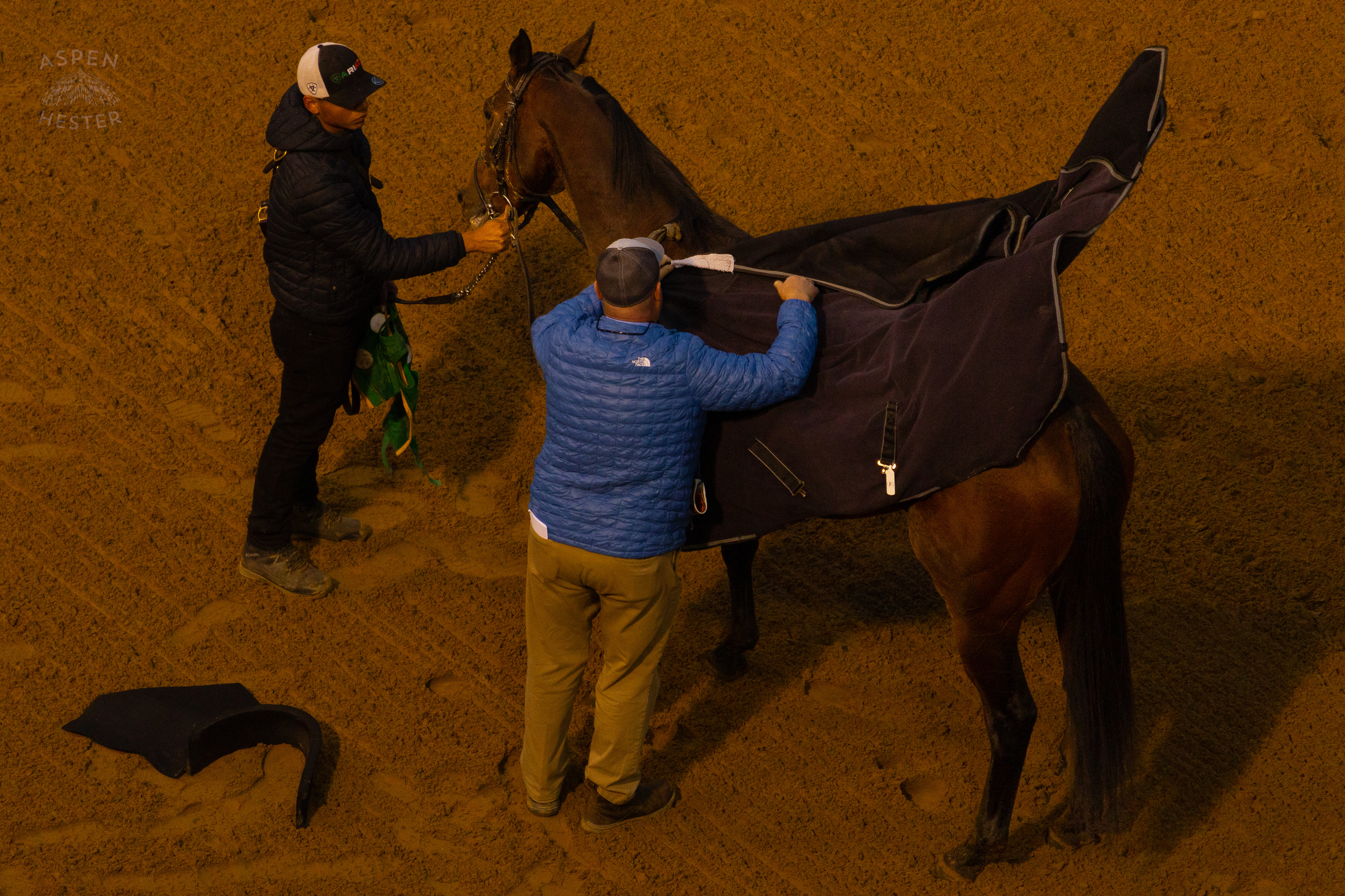 Caretakers Putting A Warming Blanket On A Horse After Running in Race 9 On The Day Bob Baffert Returned to Churchill Downs After A 3 Year Suspension. November 27th, 2024/Aspen Hester