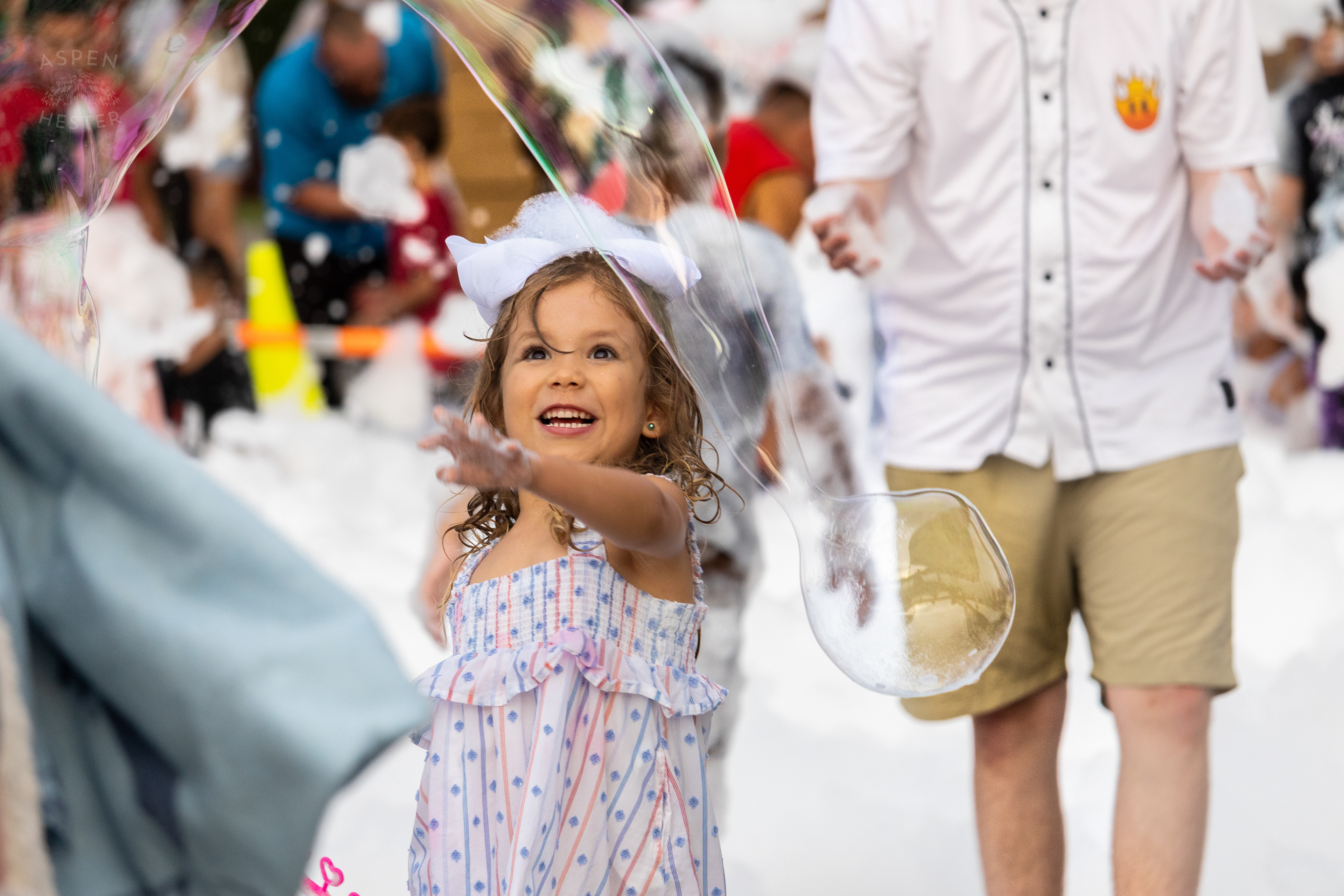 Christina Sanjuan's Daughter Playing in the Bubble Party at Waterfront Park Fourth of July. July 4th, 2024/Aspen Hester