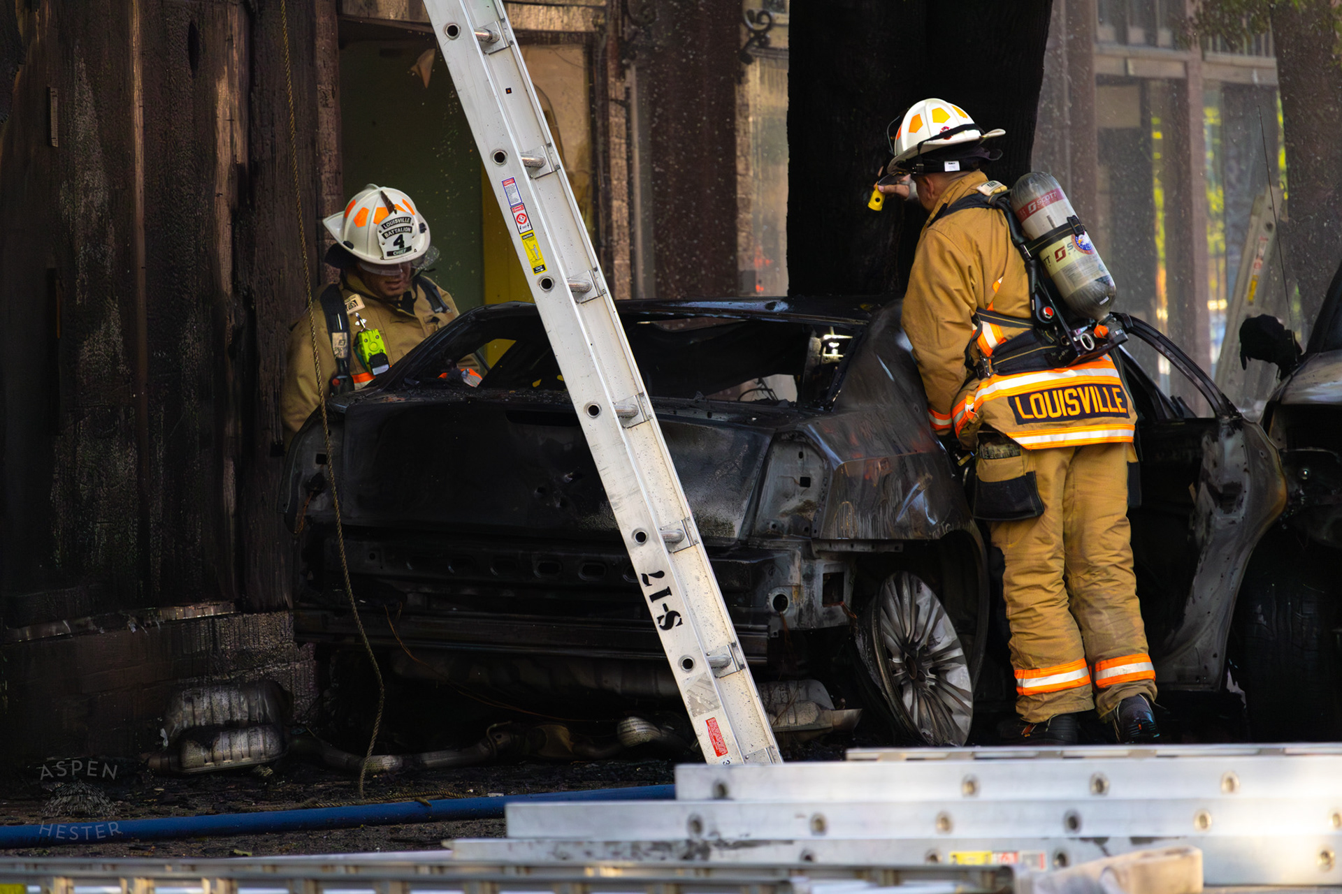 Louisville Firefighters Inspect the Remains of A Fiery Crash on The Corner of 2nd and Oak Street. June 7th, 2024/Aspen Hester