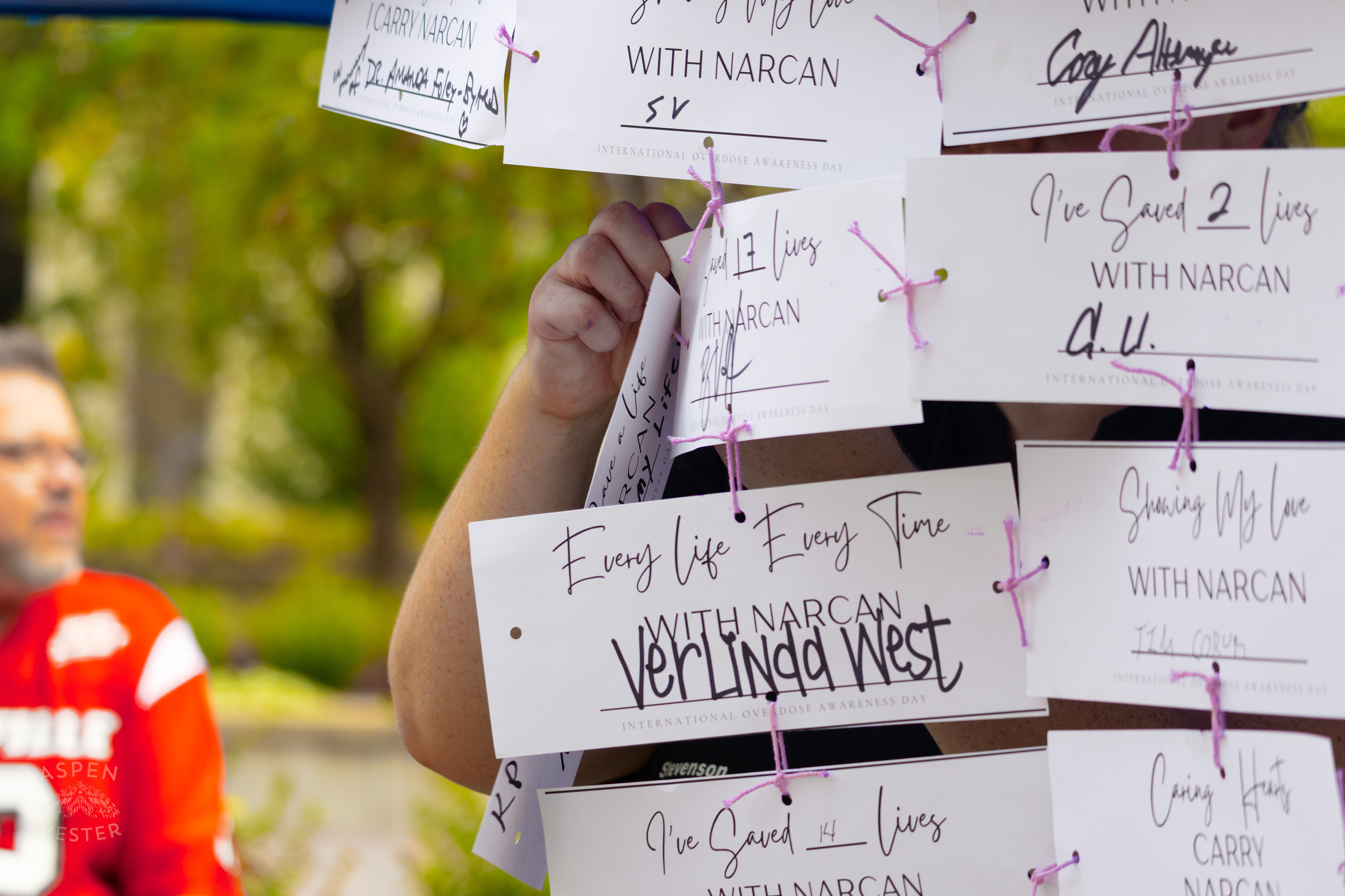 Cards Sharing Why People Carry Narcan with Them at The 3rd Annual Vocal KY International Overdose Awareness Day Rally and March. August 31st, 2024/Aspen Hester