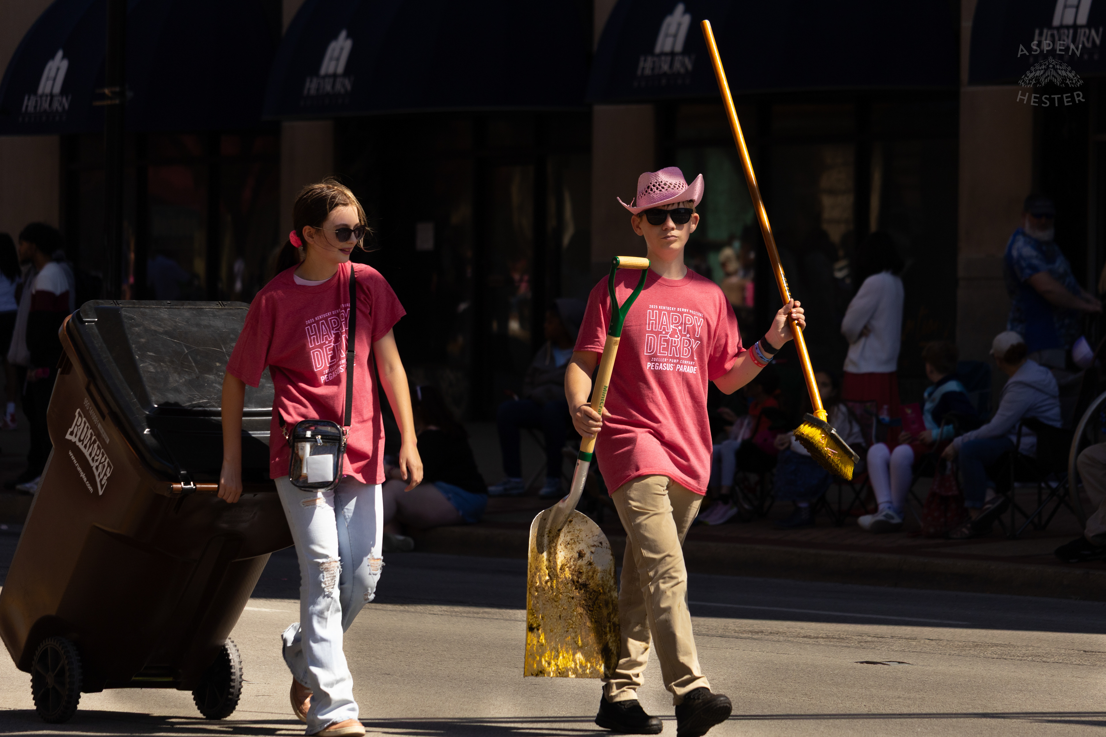 The Heroes of The Day, The Pooper Scoopers Follow Behind The Horses of The 70th Annual Pegasus Parade. April 27th, 2025/Aspen Hester