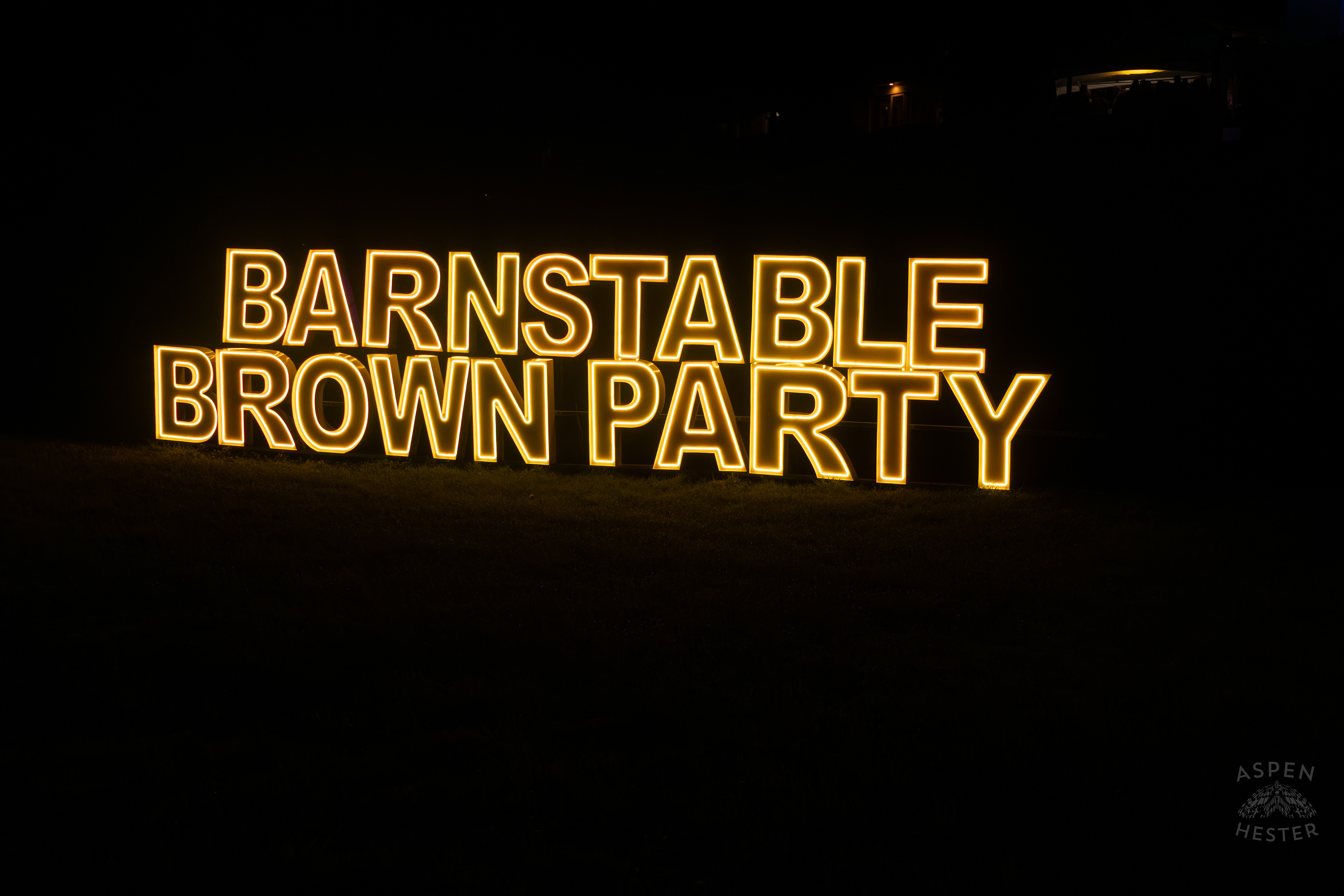 A Neon Sign Lights Up The Yard of The Highlands Mansion for The 2025 Barnstable-Brown Gala. May 2nd, 2025/Aspen Hester