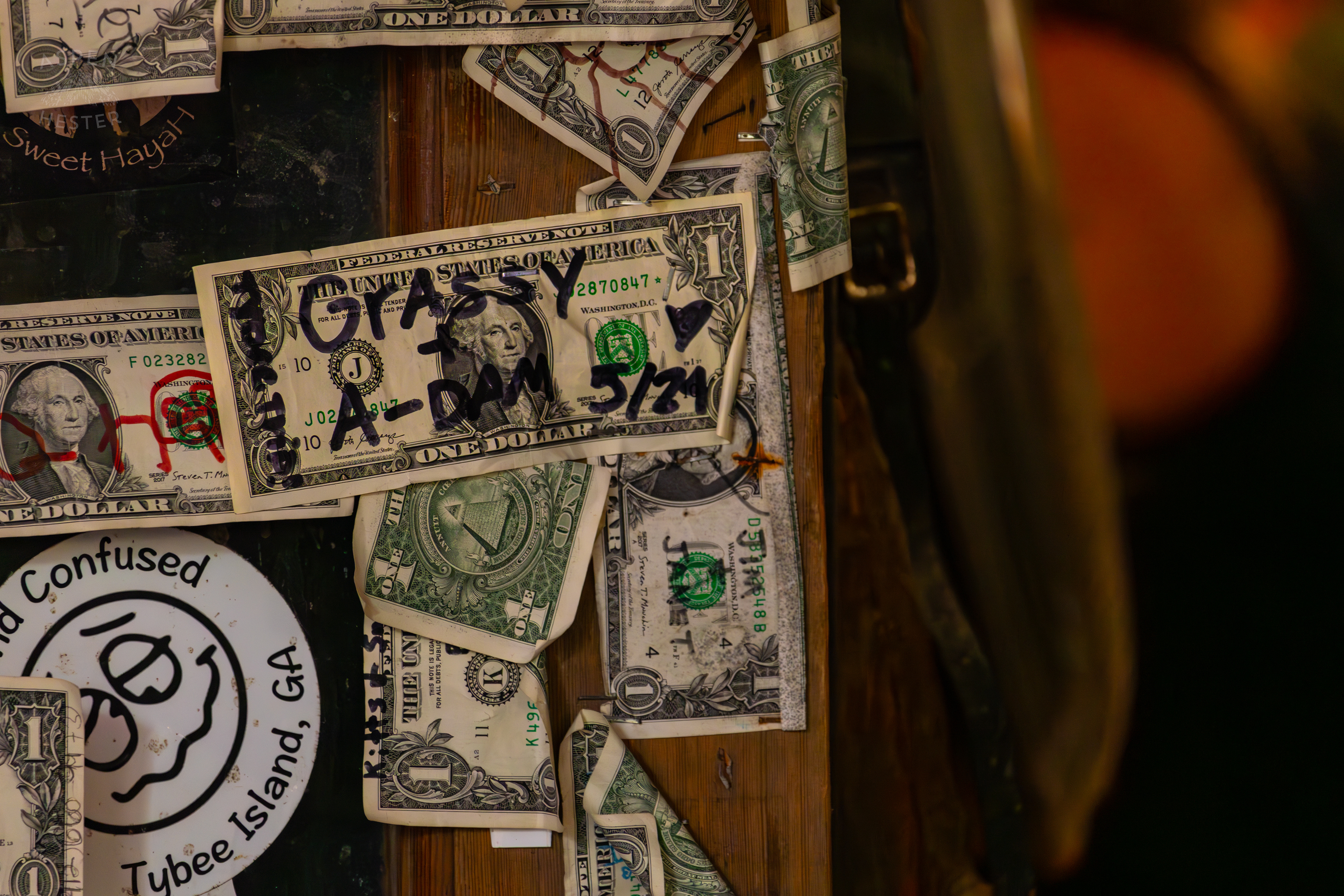 Dollar Bills Stapled to Huc-A-Poos Bites and Booze on Tybee Island Georgia. June 25th, 2024/Aspen Hester