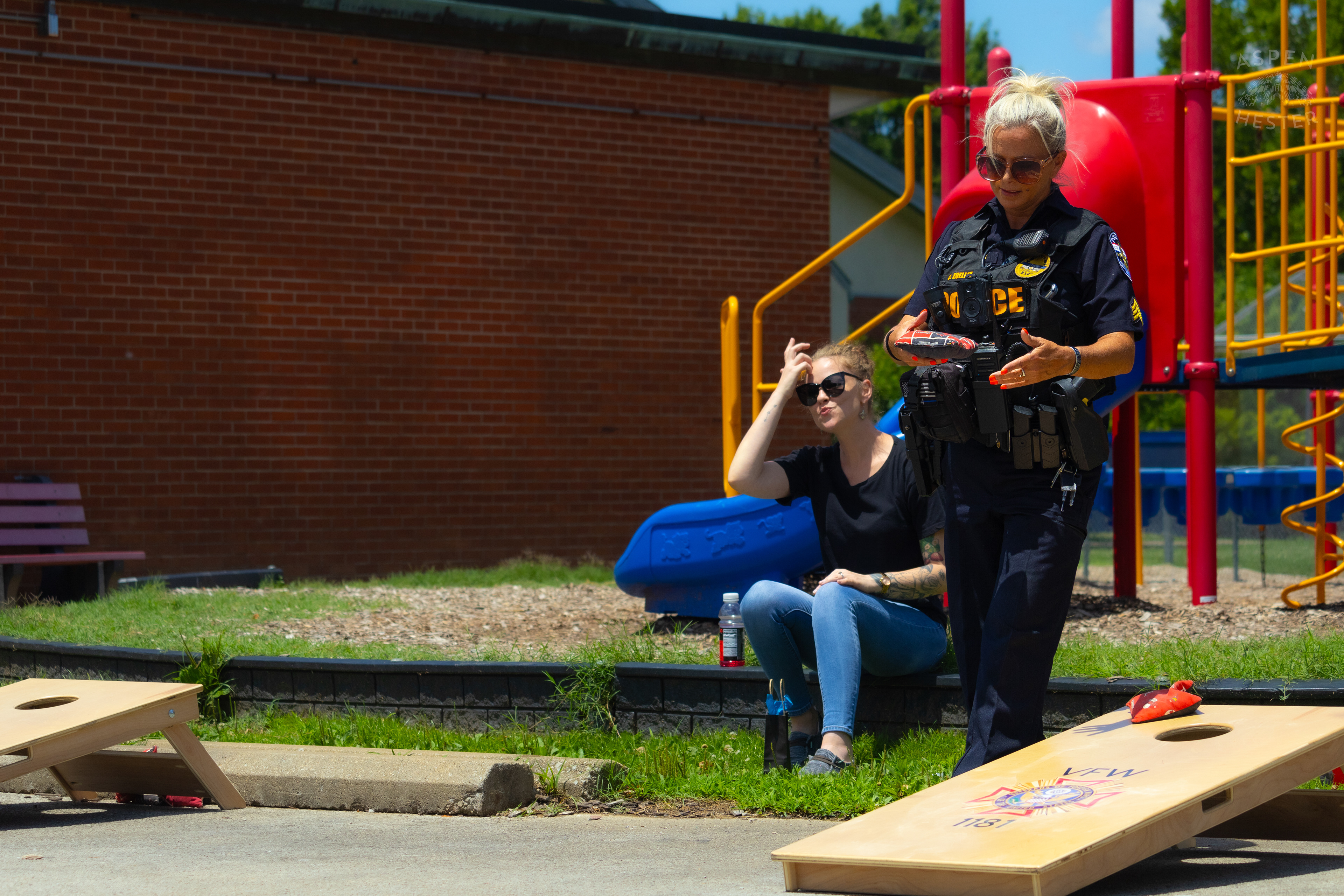 LMPD Officer Carmine Zoeller Participates in "Cornhole with Cops" Event. July 6th, 2024/Aspen Hester