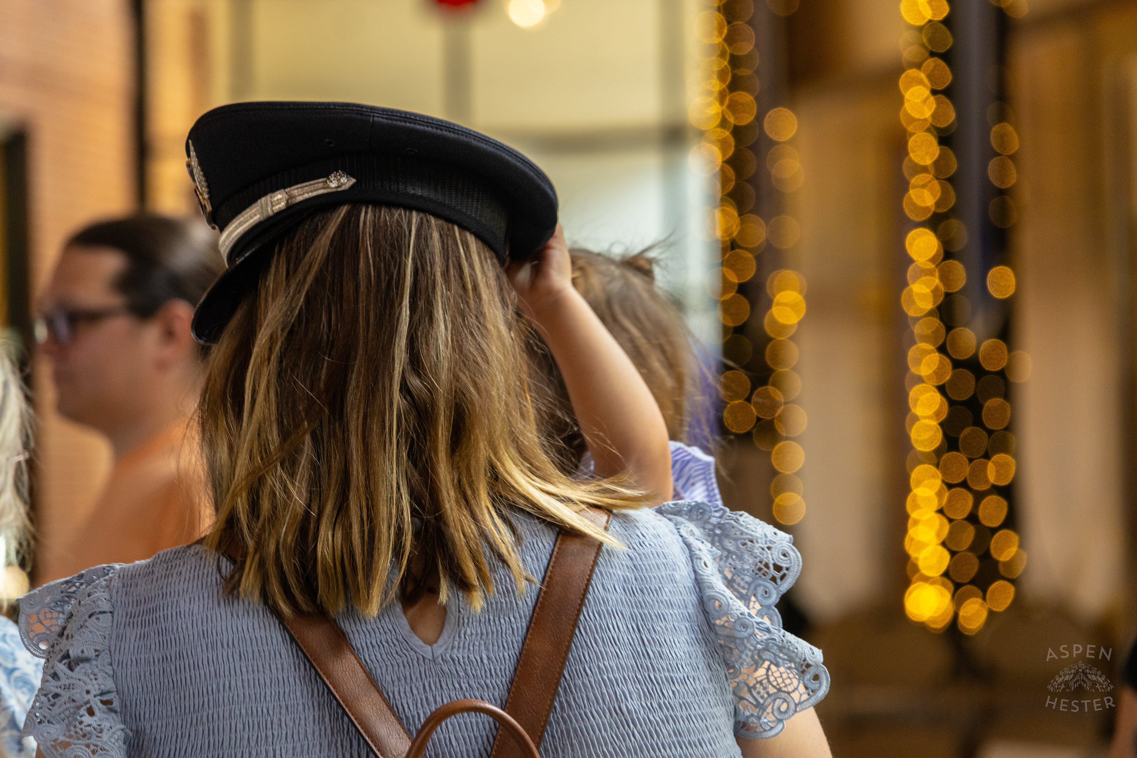  Child Plays with The Hat of A Recruit at The Graduation of MAC 59 into LMPD. August 30th, 2024Aspen Hester