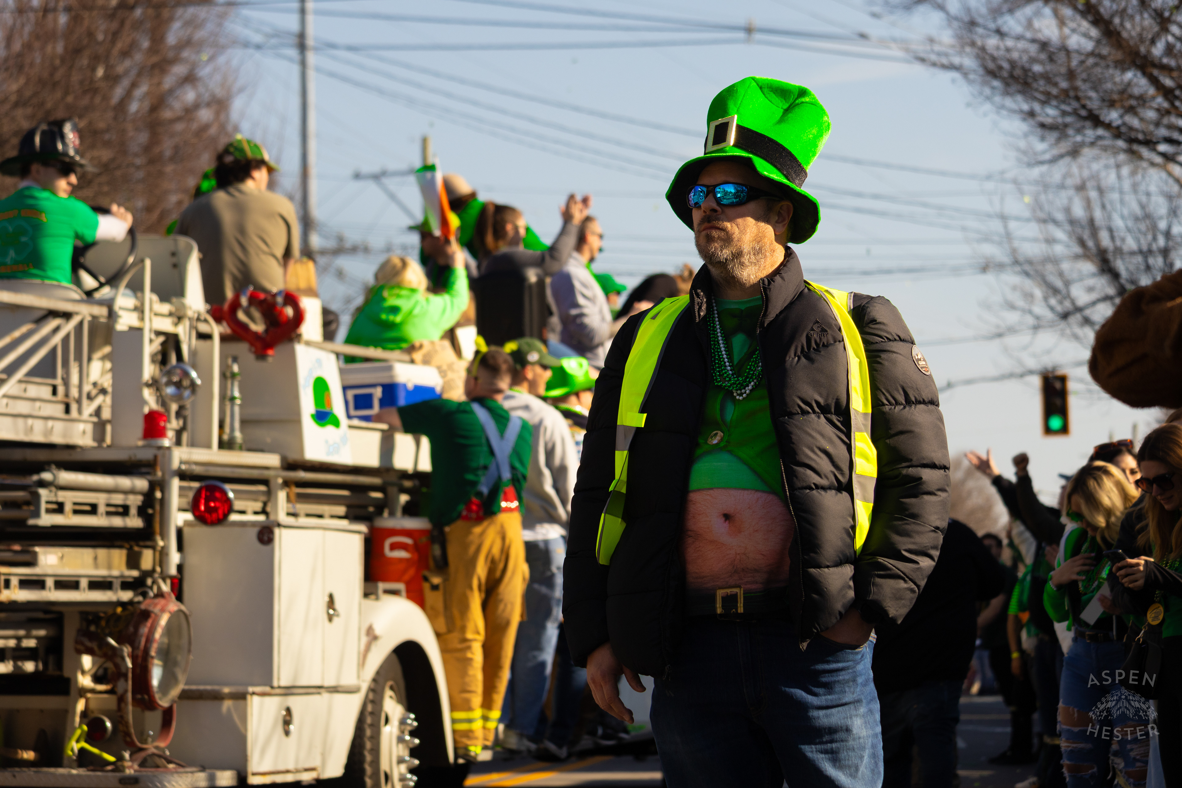 Decked Out Spectators Watch as The 52nd Annual Saint Patrick’s Day Parade Rolls Through The Highlands. March 8th, 2025/Aspen Hester